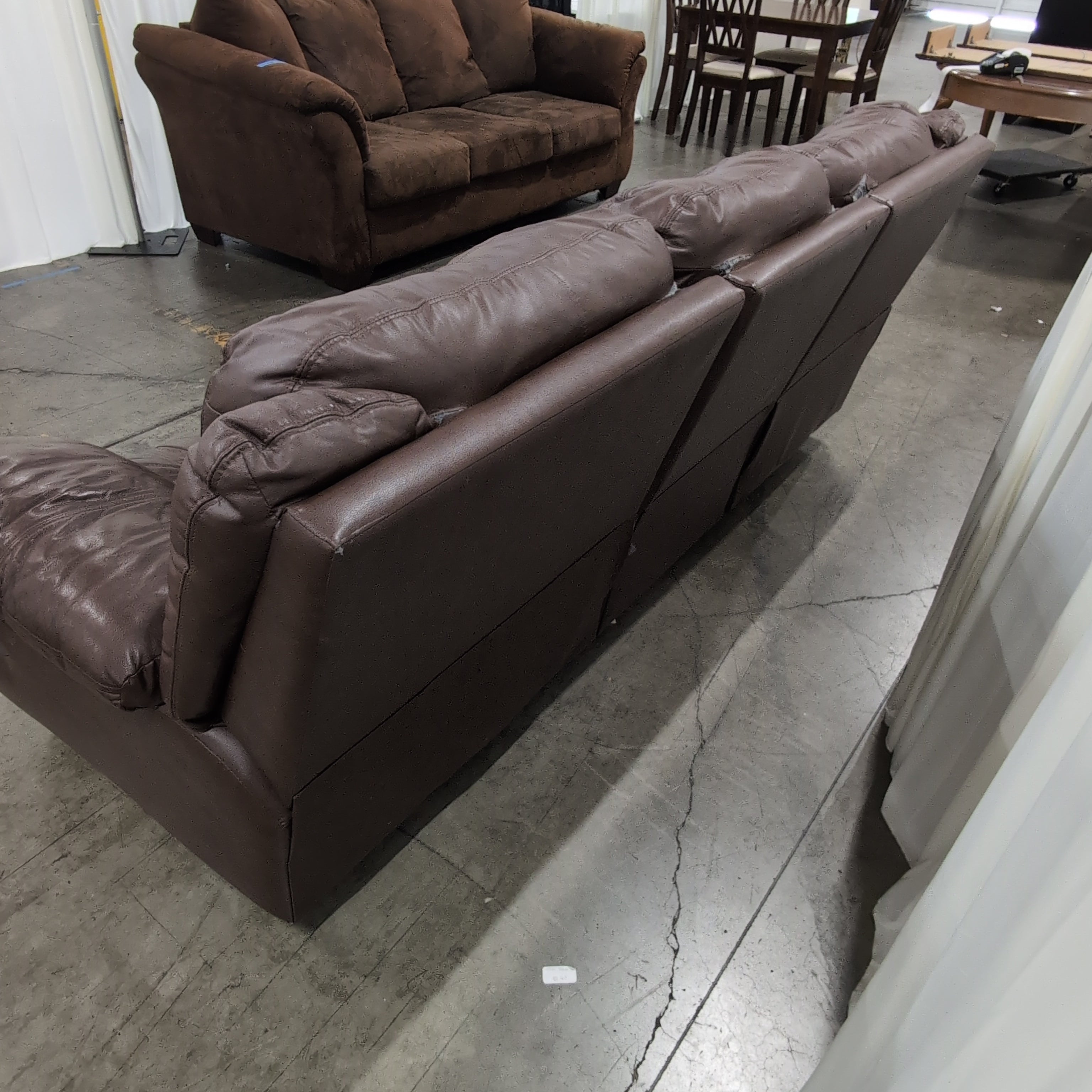 Brown Leather Three-Seat Recliner Couch