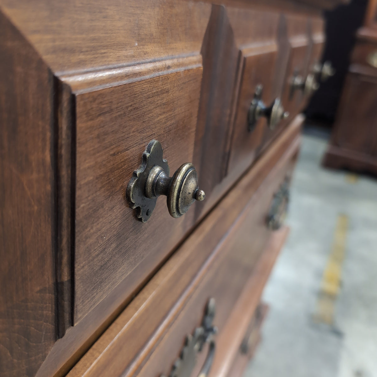 Traditional Brown Wood Dresser with Ornate Hardware