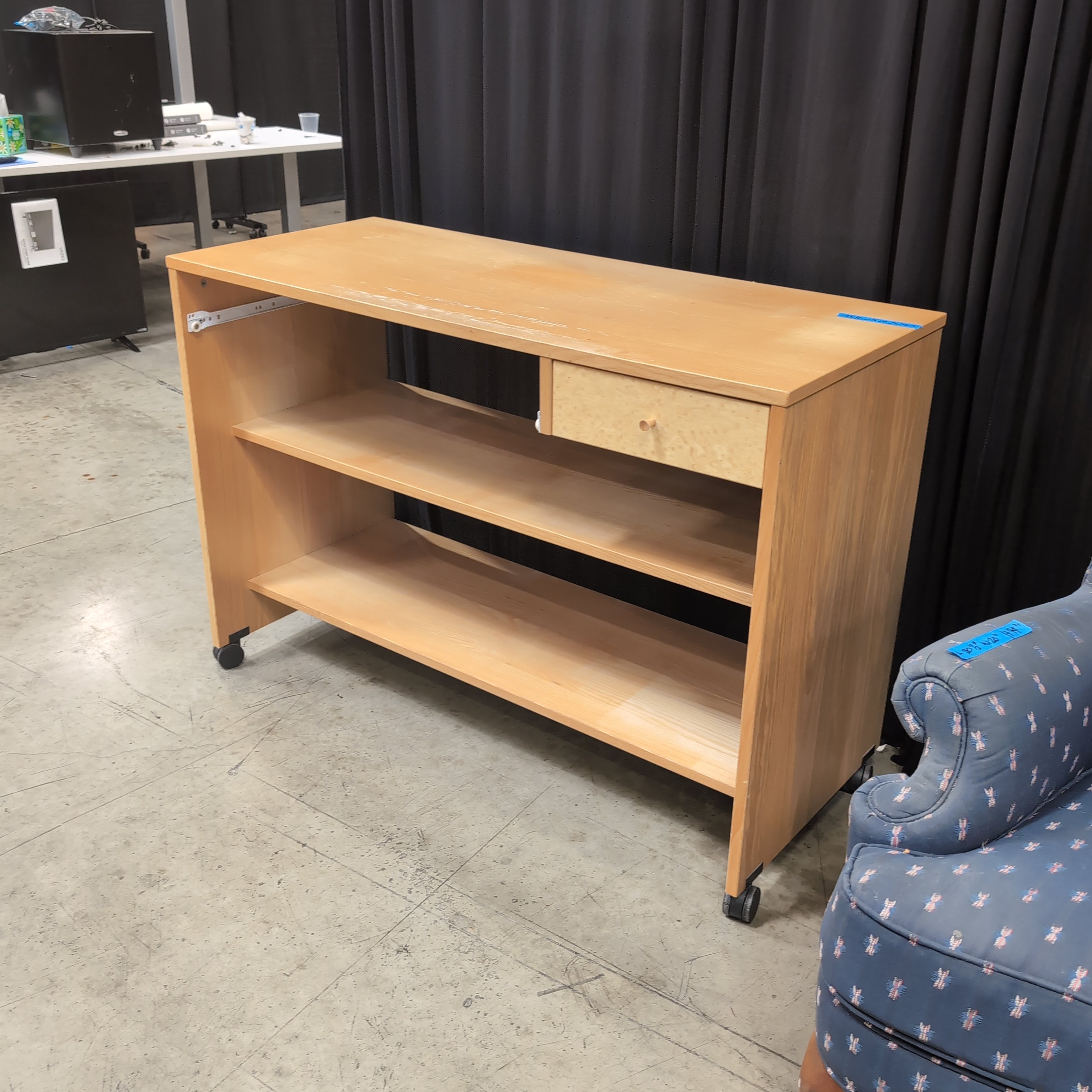 Light Wood Three-Shelf Bookcase with Casters