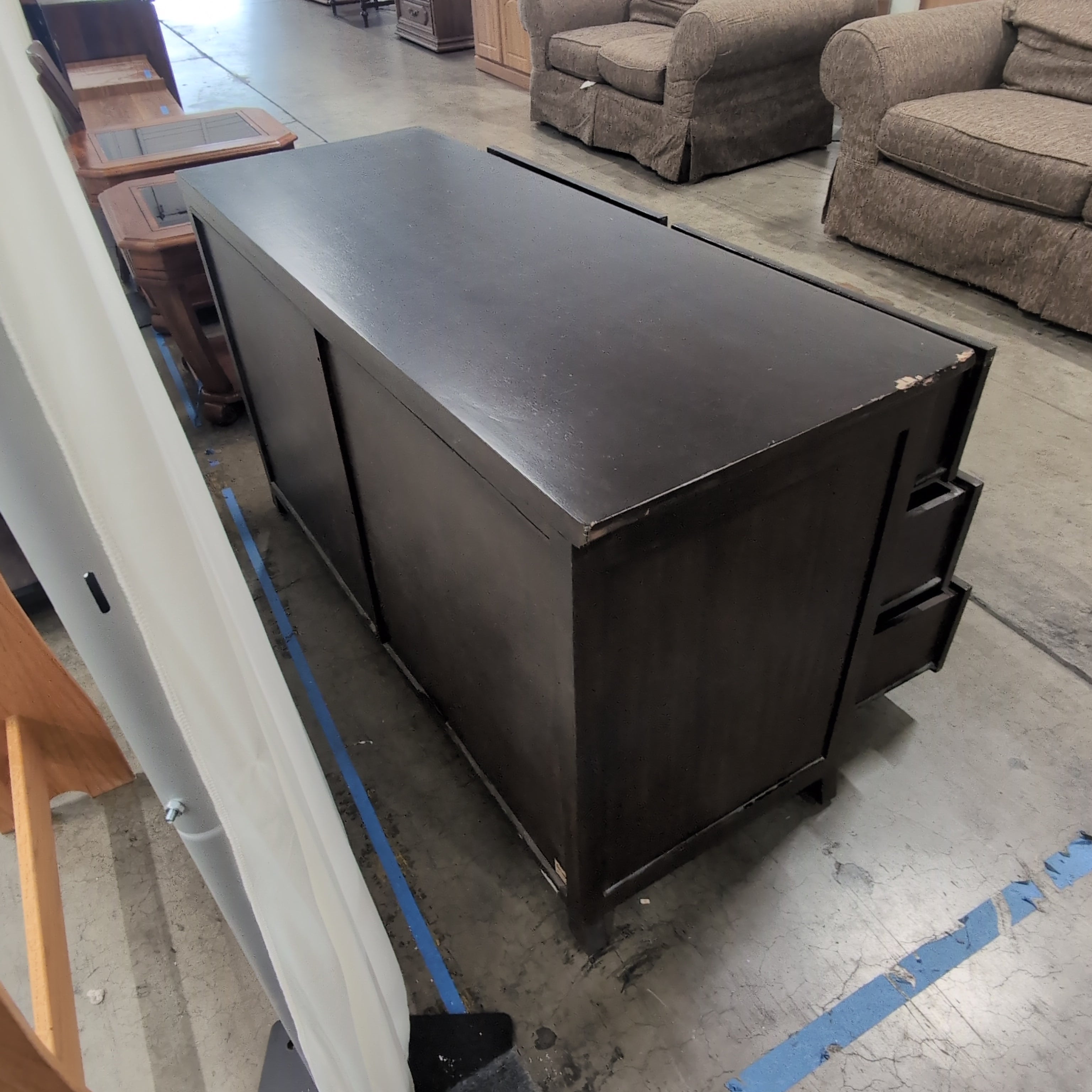 Dark Brown Six-Drawer Dresser with Ornate Carvings