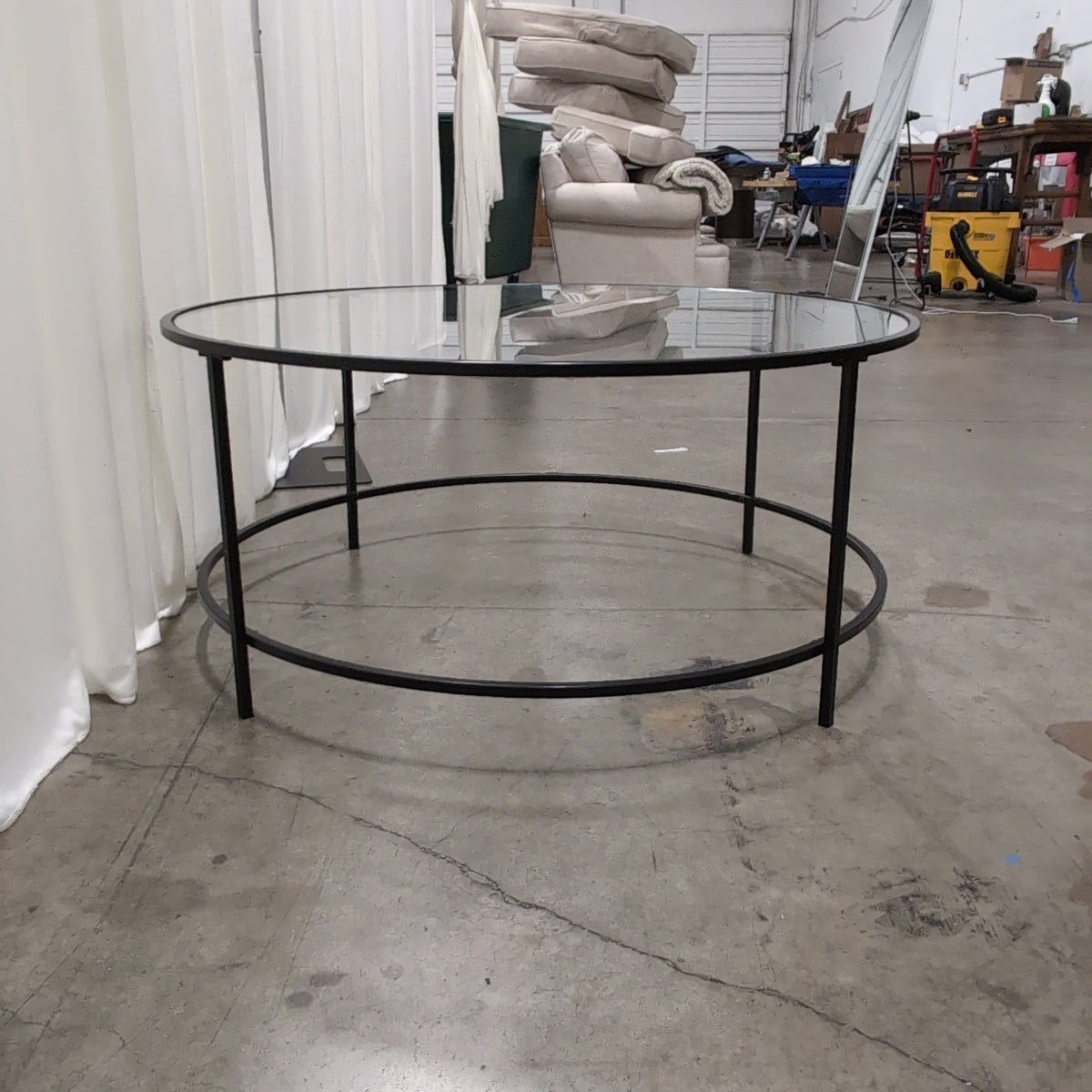 Round Glass Coffee Table with Black Metal Frame