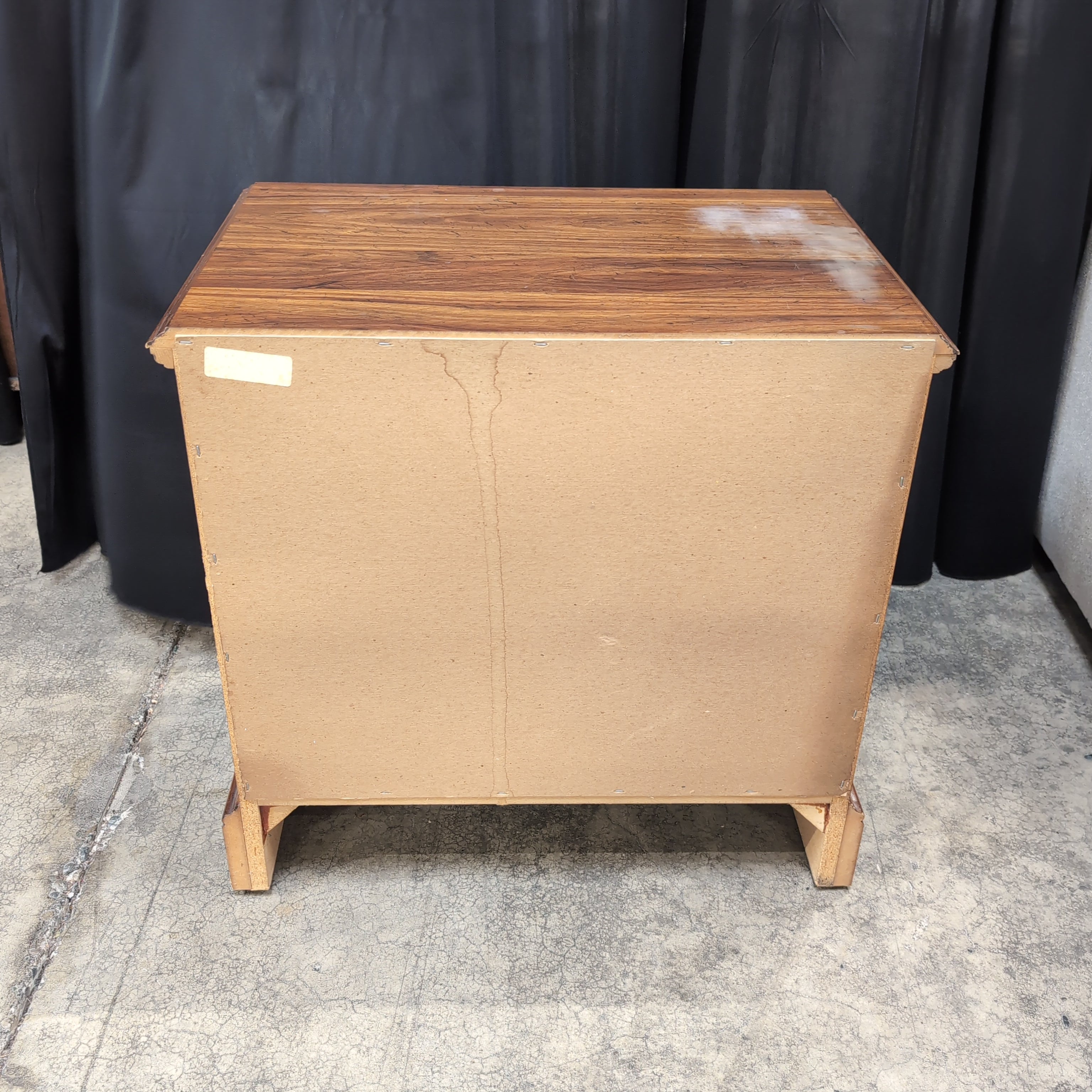 Traditional Dark Wood Two-Drawer Nightstand with Ornate Hardware