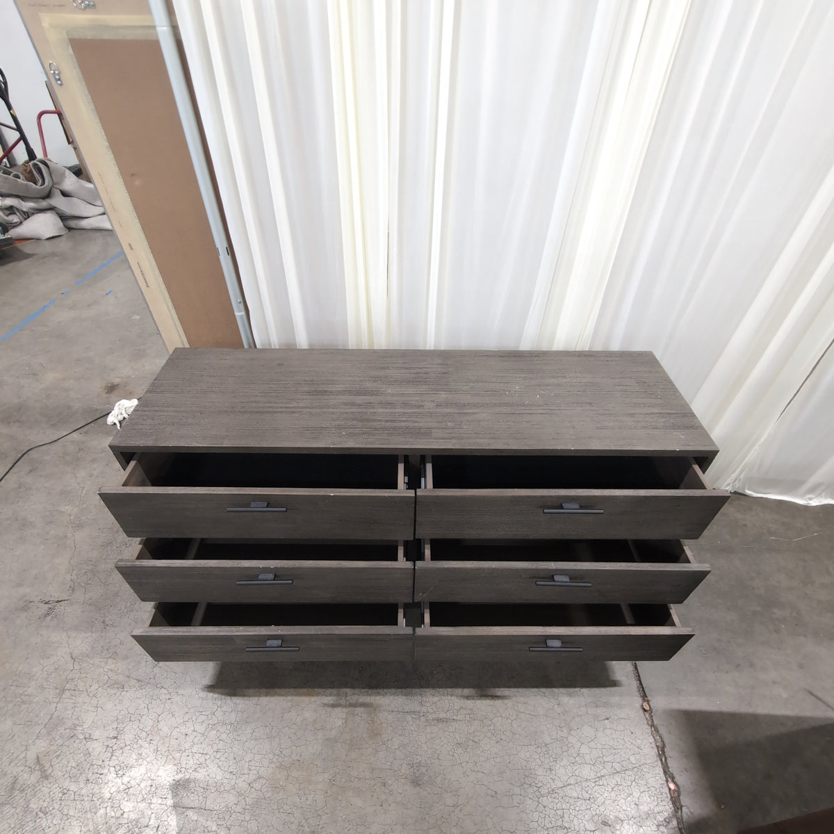 Minimalist Dark Wood Six-Drawer Dresser with Black Legs