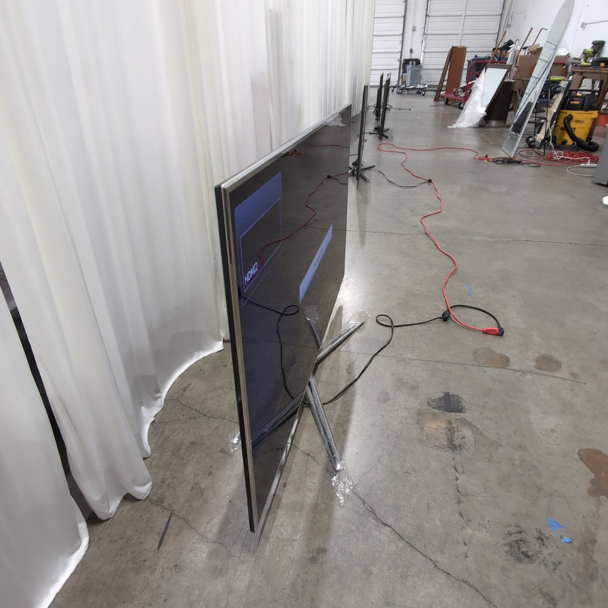 Samsung Modern Black Flat-Screen TV with Silver Stand
