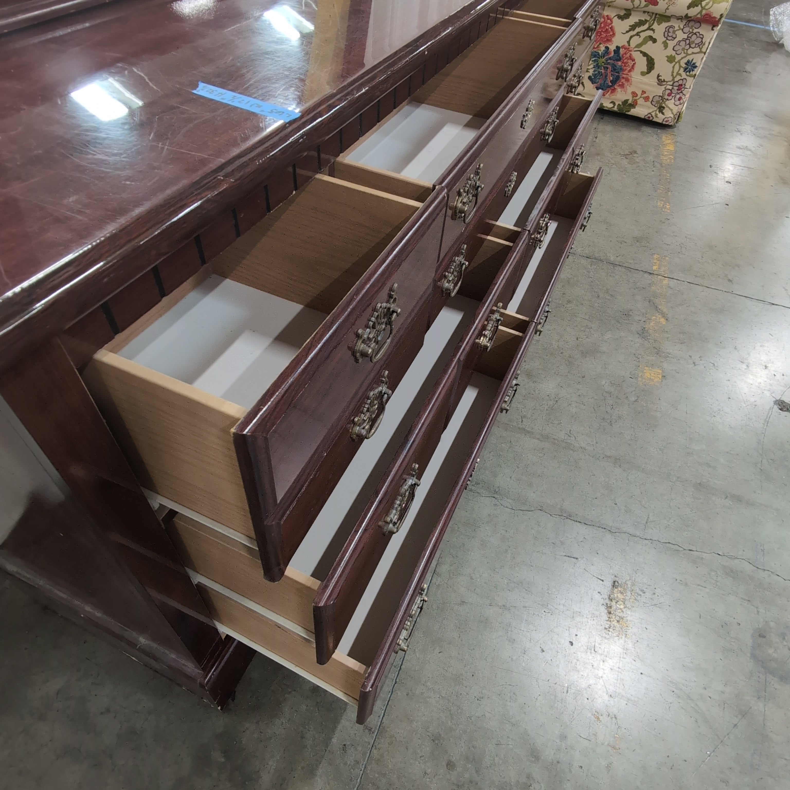 Dark Wood Traditional Dresser with Ornate Hardware
