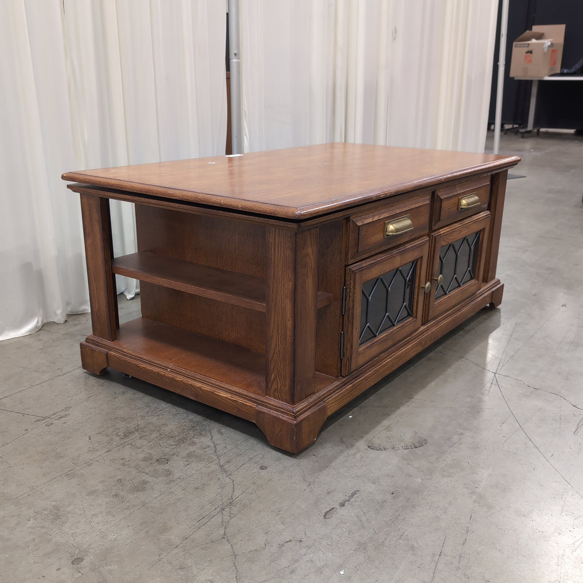 Brown Wood Coffee Table with Patterned Glass Doors