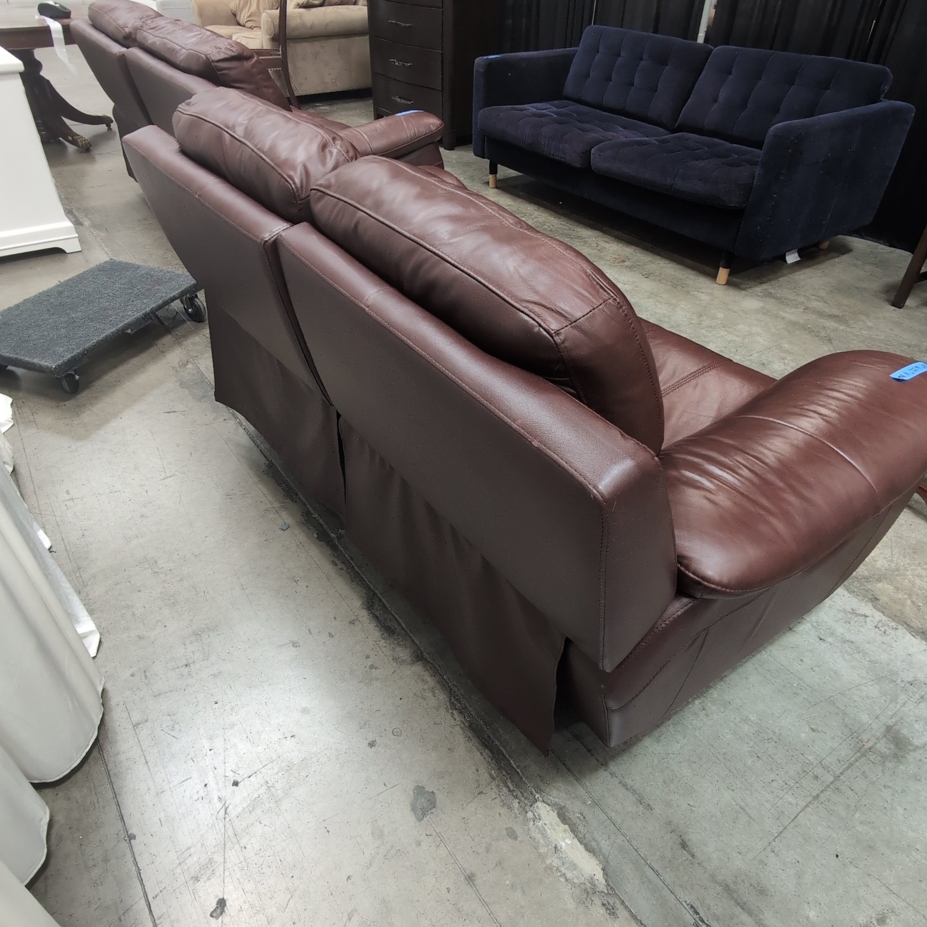 Deep Brown Leather Reclining Loveseat with Padded Arms