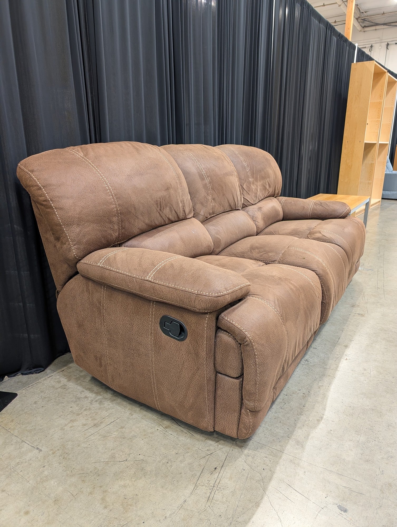 Brown Faux Leather Three-Seat Reclining Couch