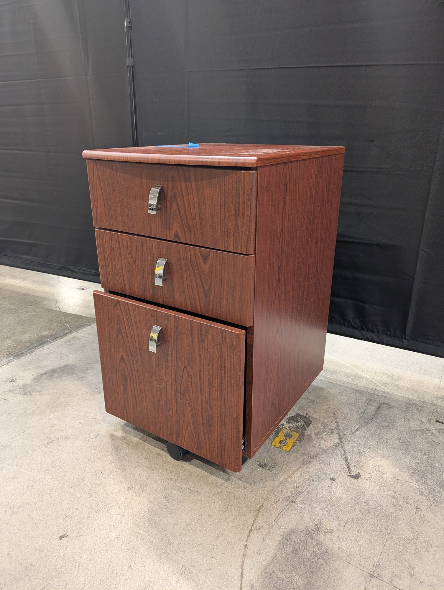 Brown Wood Grain Three-Drawer Filing Cabinet with Casters