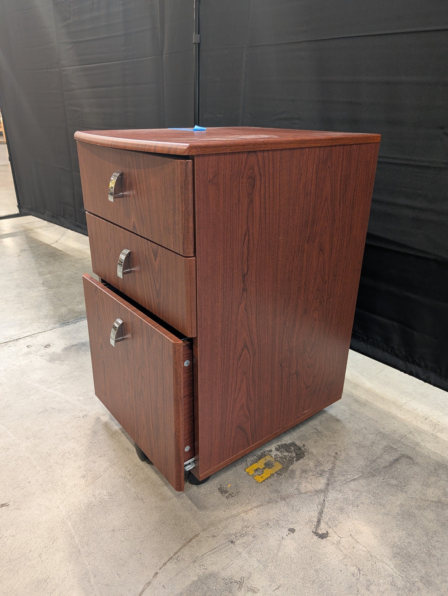 Brown Wood Grain Three-Drawer Filing Cabinet with Casters