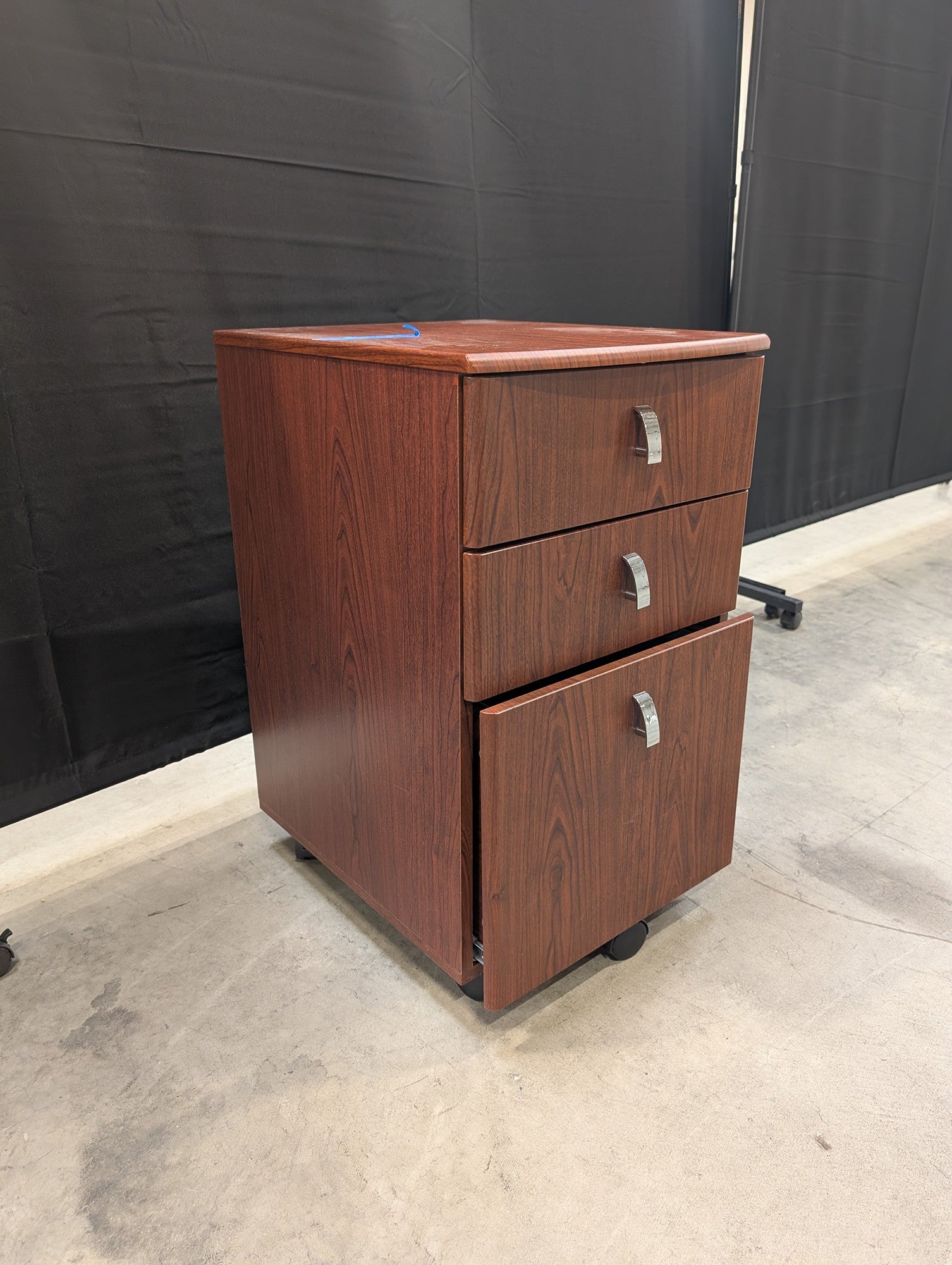 Brown Wood Grain Three-Drawer Filing Cabinet with Casters