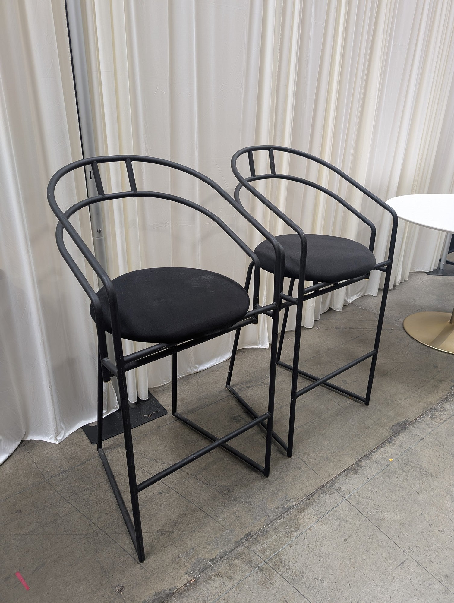 Pair of Modern Black Metal Bar Stools with Round Cushions