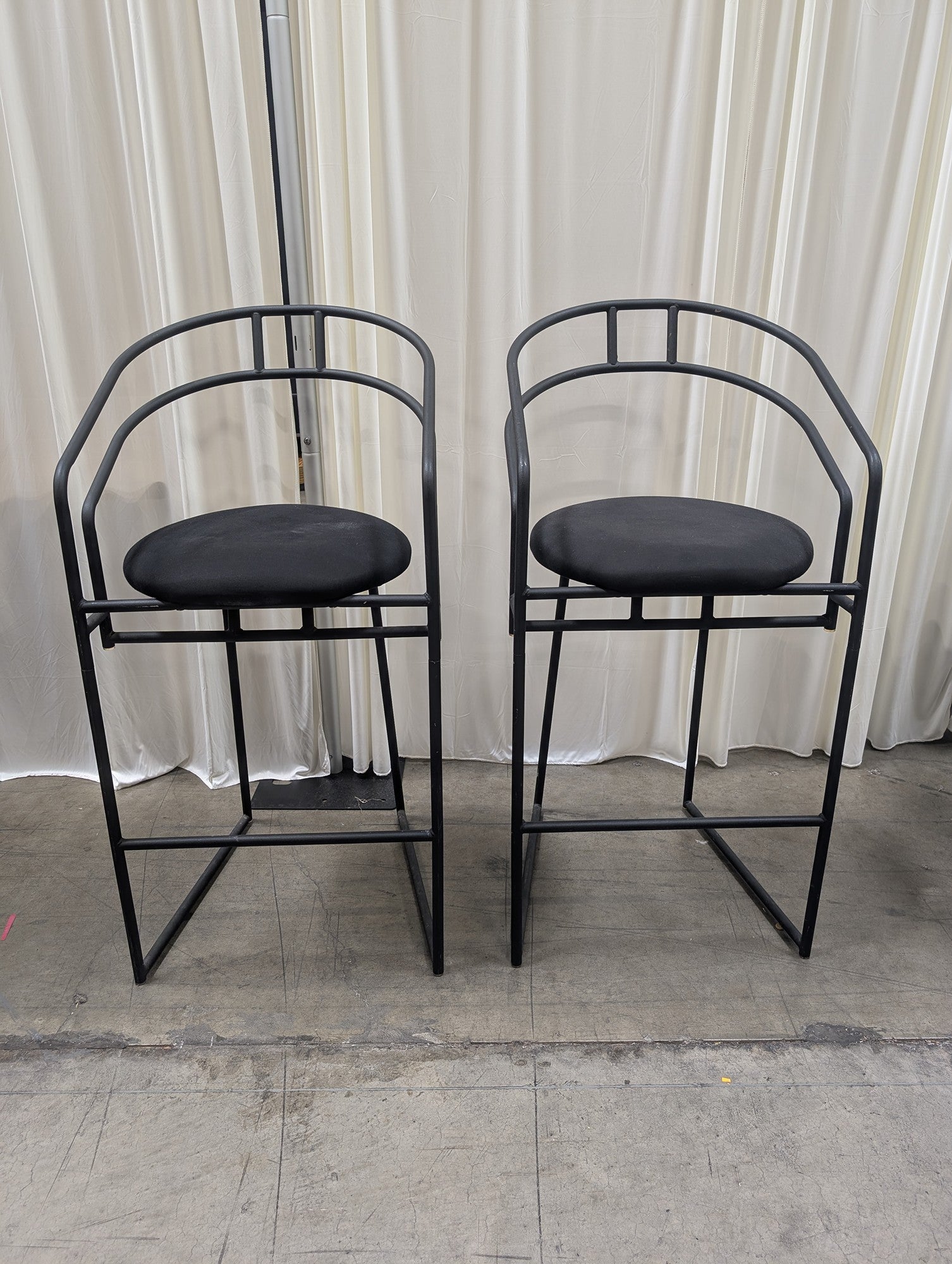 Pair of Modern Black Metal Bar Stools with Round Cushions