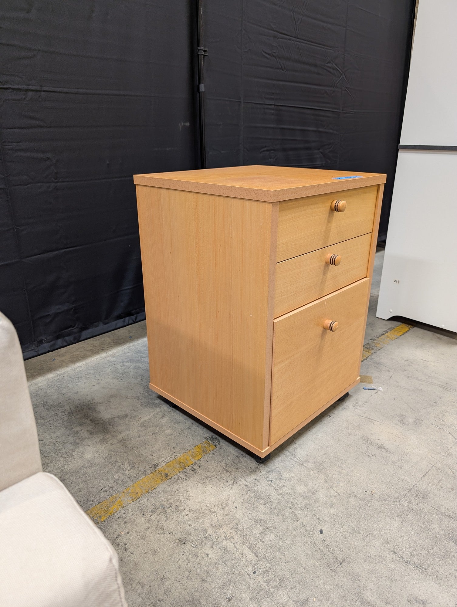 Light Wood Three-Drawer Storage Cabinet with Casters