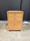 Light Wood Three-Drawer Storage Cabinet with Casters