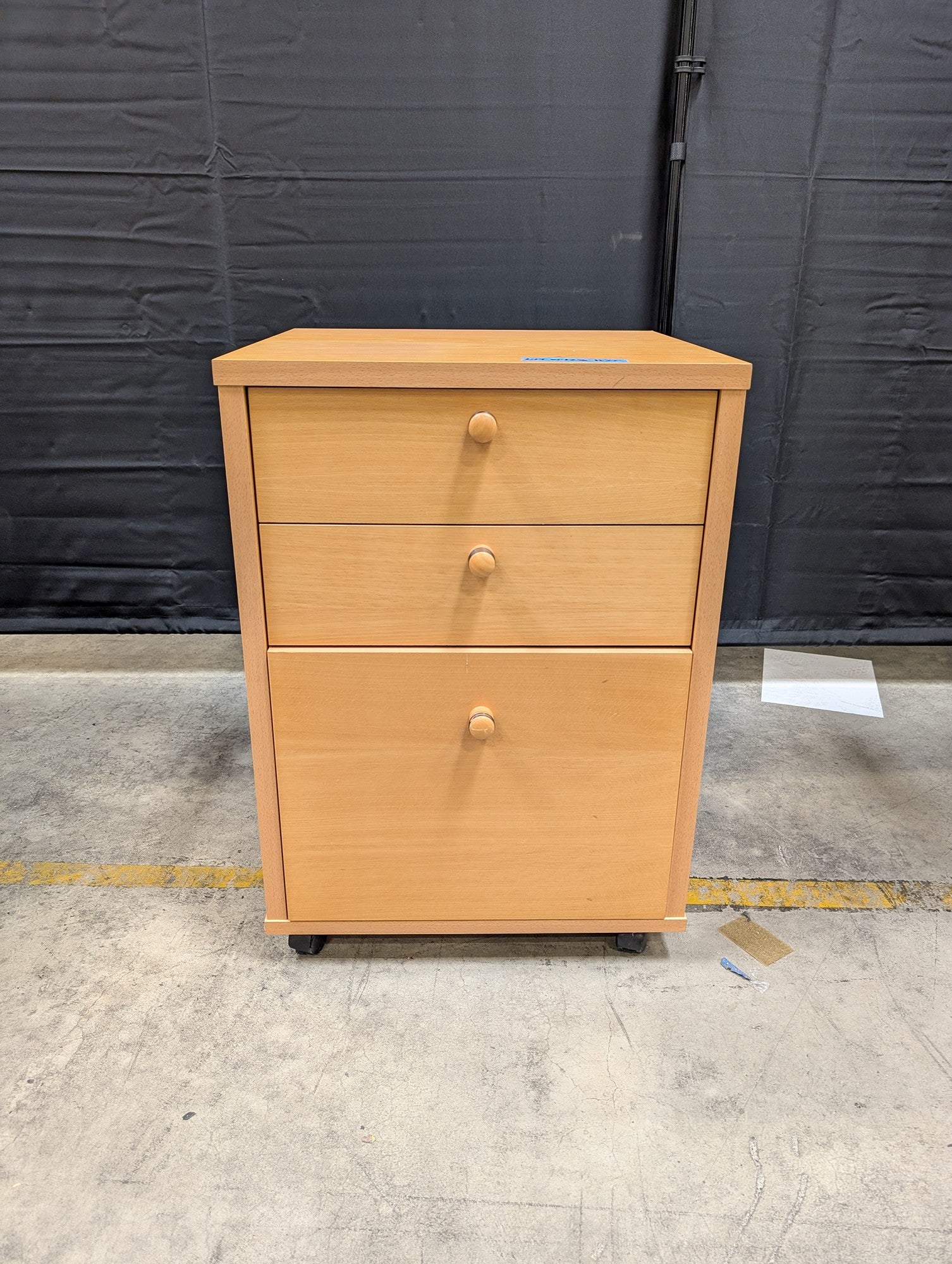 Light Wood Three-Drawer Storage Cabinet with Casters