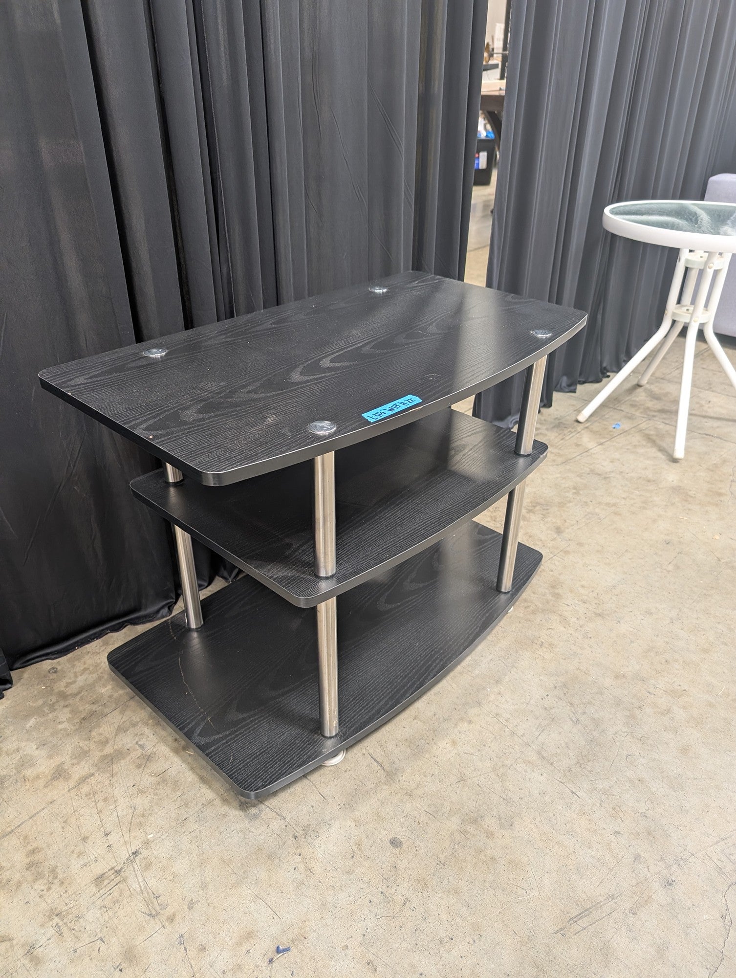 Black Three-Tier TV Stand with Curved Shelves