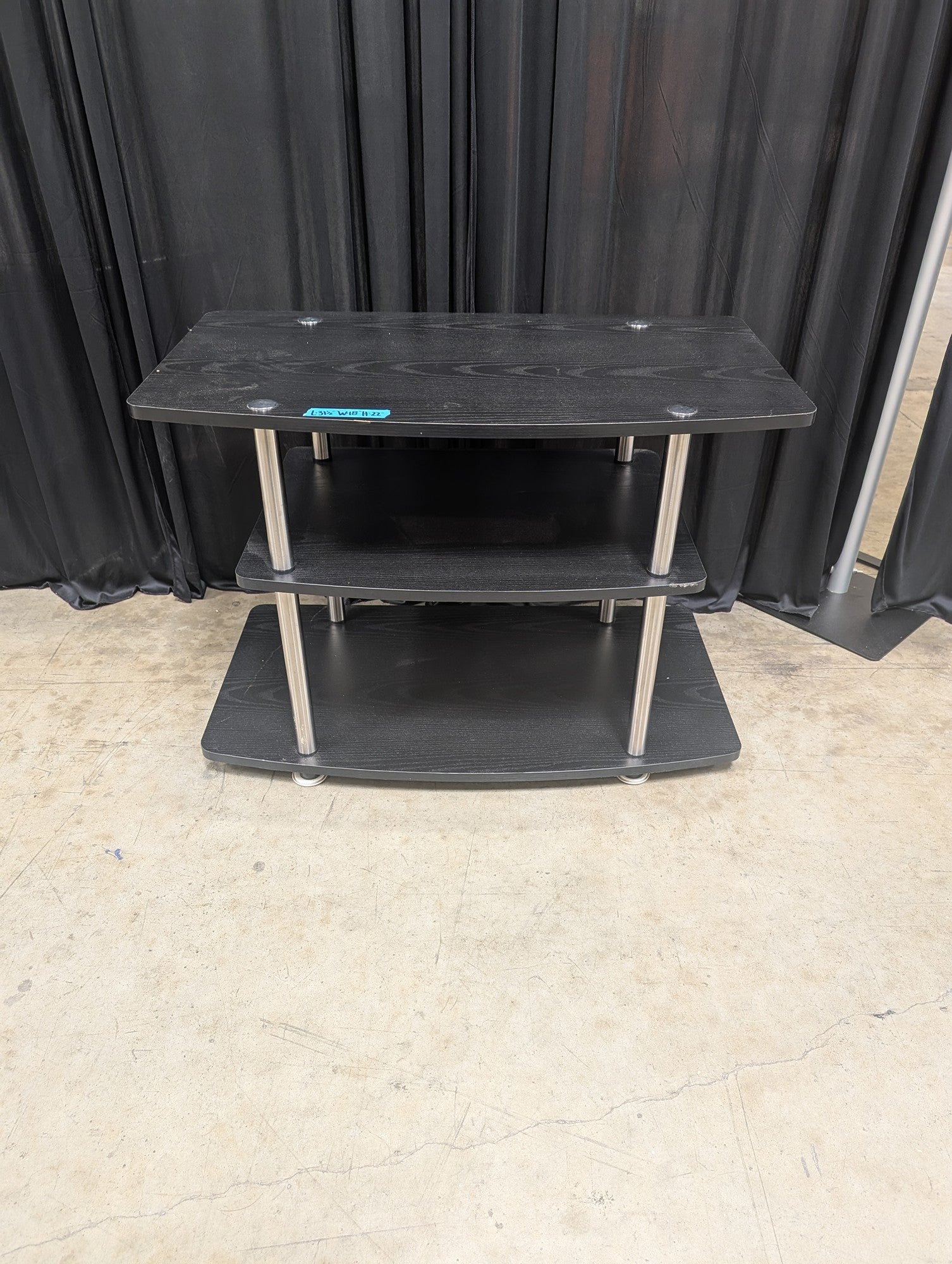 Black Three-Tier TV Stand with Curved Shelves
