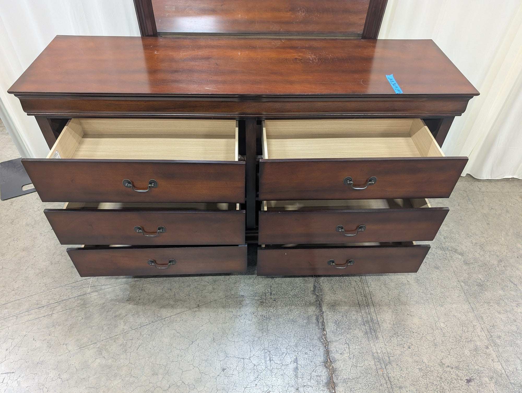Dark Wood Six-Drawer Dresser with Rounded Mirror