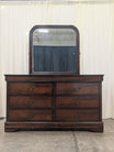 Dark Wood Six-Drawer Dresser with Rounded Mirror