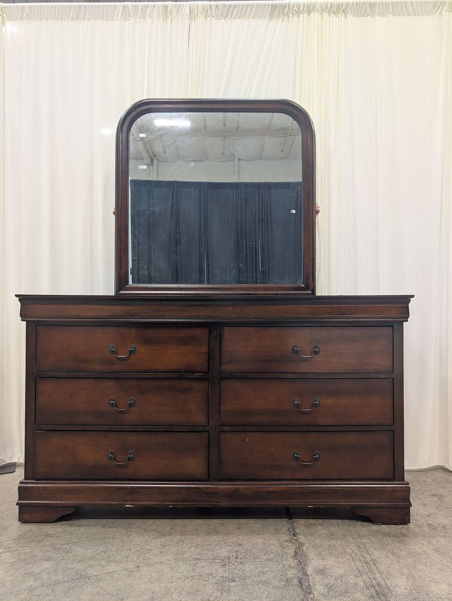 Dark Wood Six-Drawer Dresser with Rounded Mirror