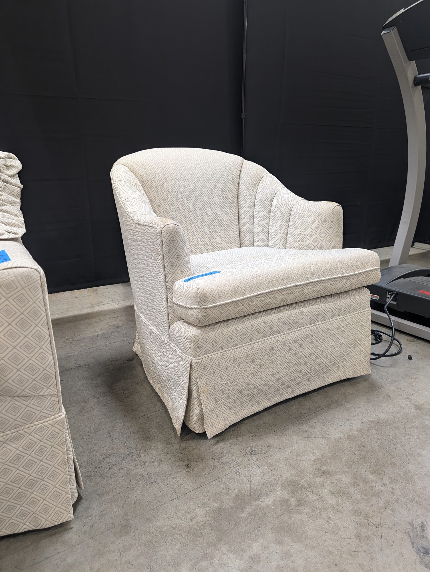 Upholstered Club Chair with Geometric Diamond Pattern and Skirted Base