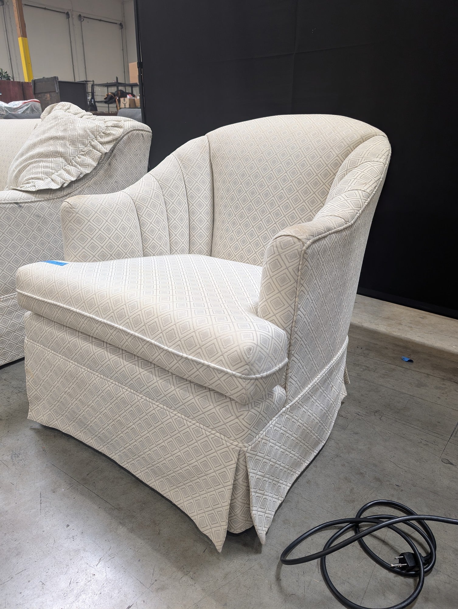 Upholstered Club Chair with Geometric Diamond Pattern and Skirted Base