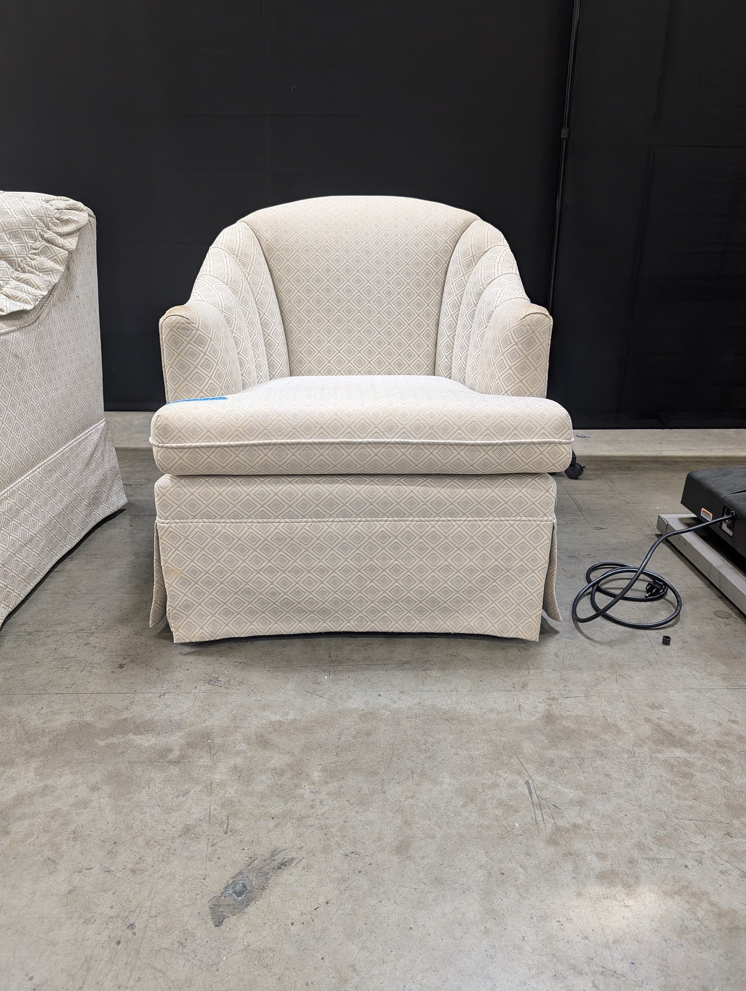 Upholstered Club Chair with Geometric Diamond Pattern and Skirted Base