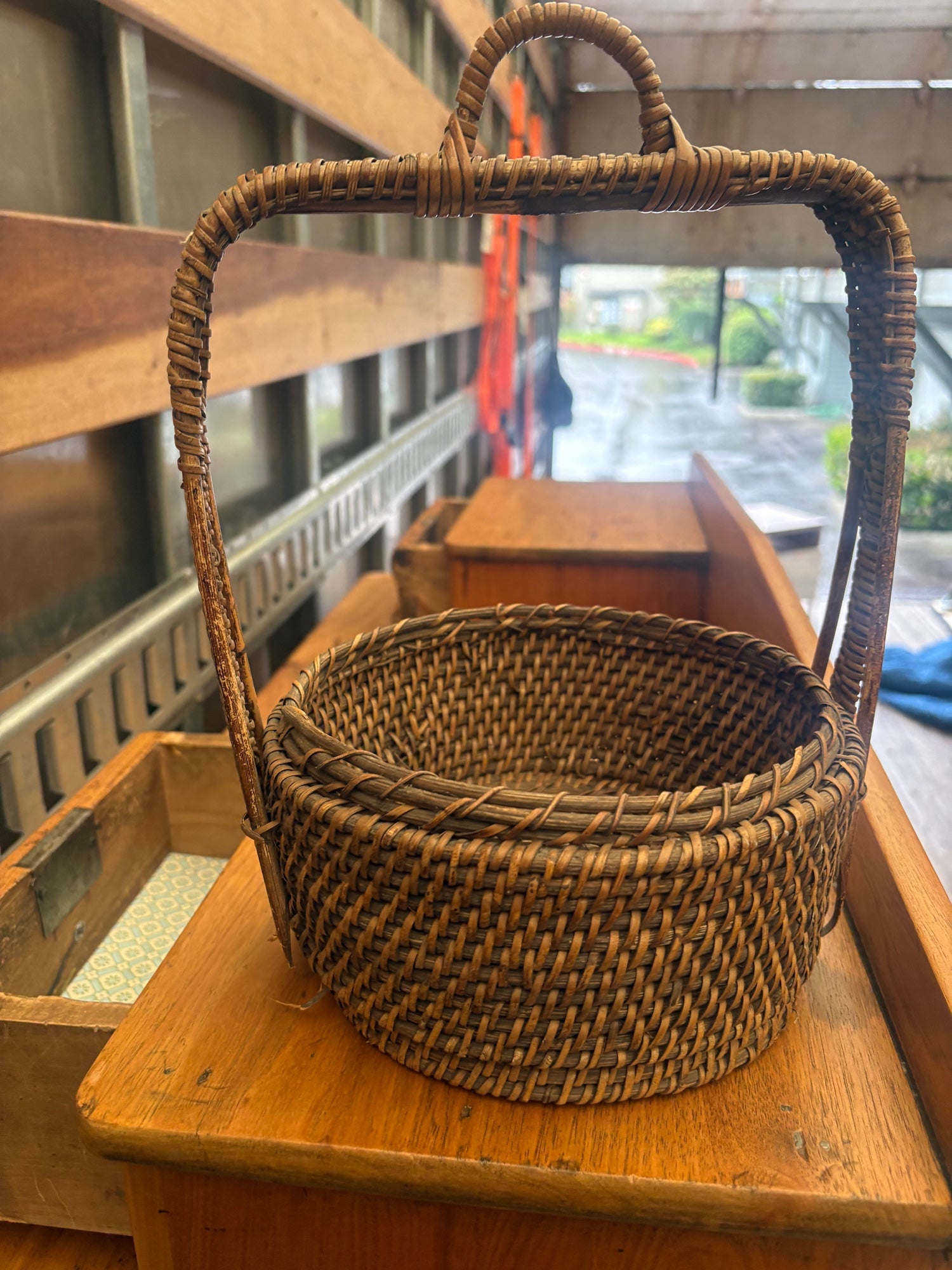 Rustic Woven Rattan Round Storage Basket with Arched Handle