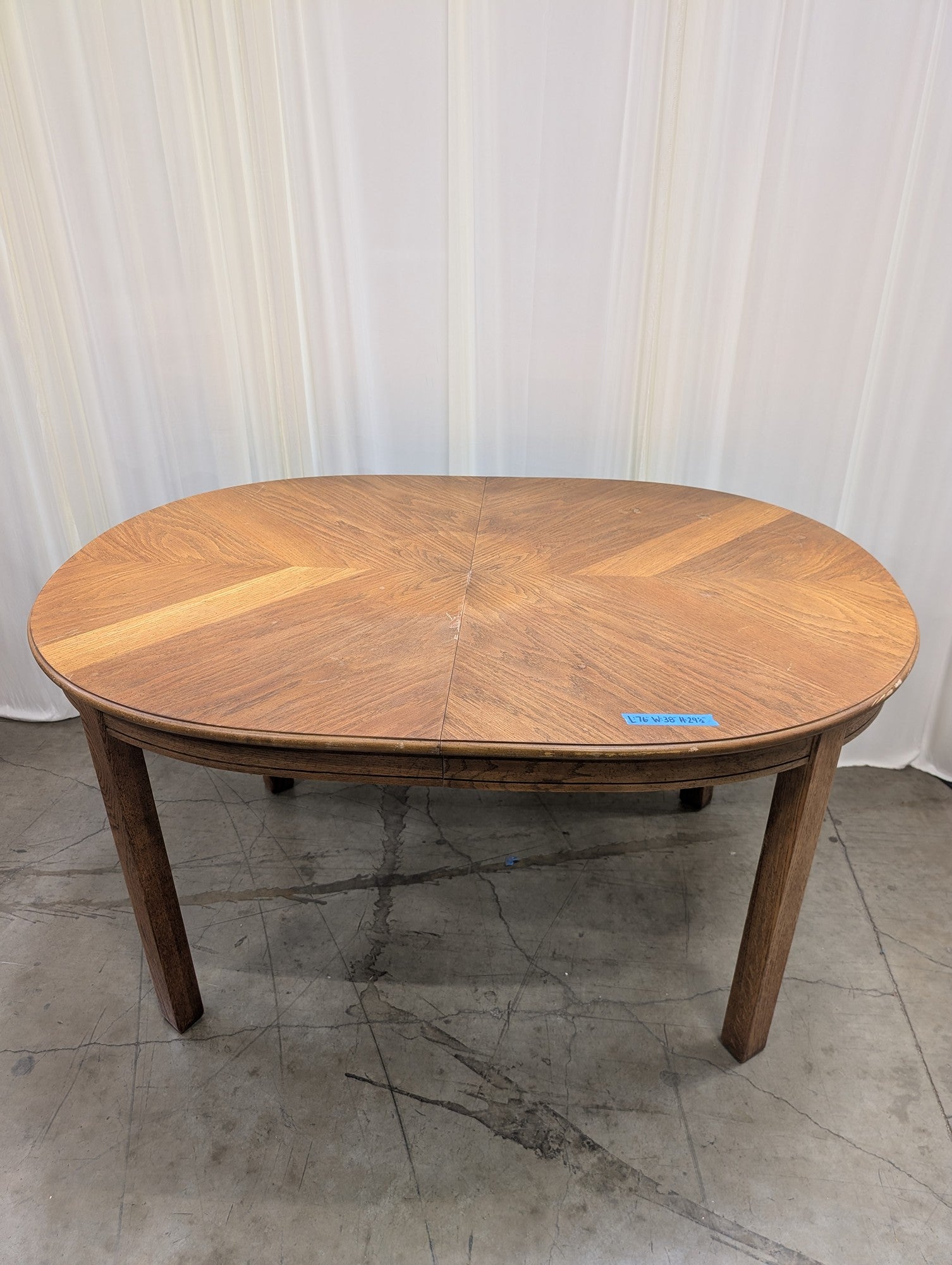 Oval Wood Dining Table with Extension Leaf