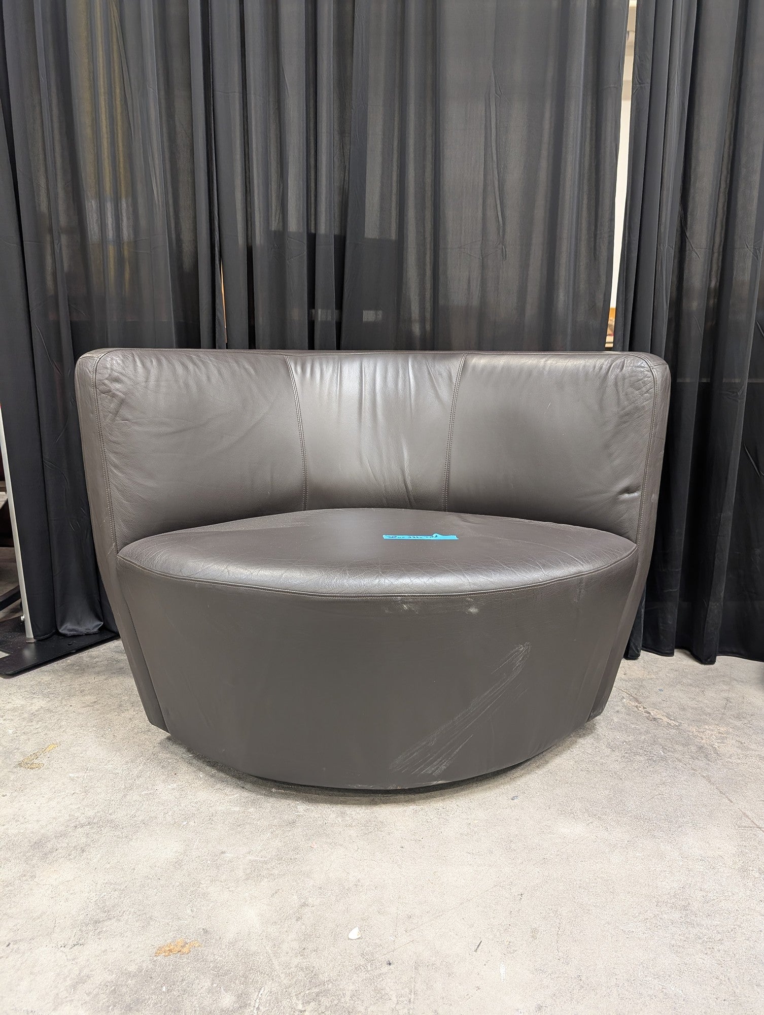 Curved Grey Leather Armless Accent Chair