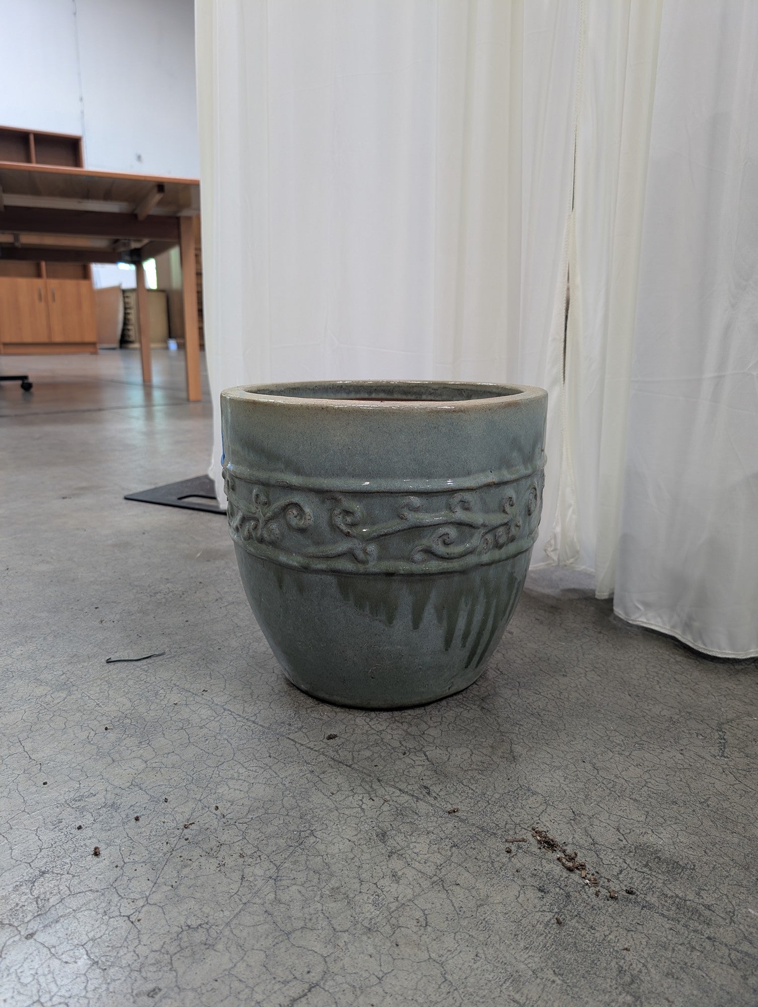 Grey-Green Ceramic Planter with Embossed Scroll Design