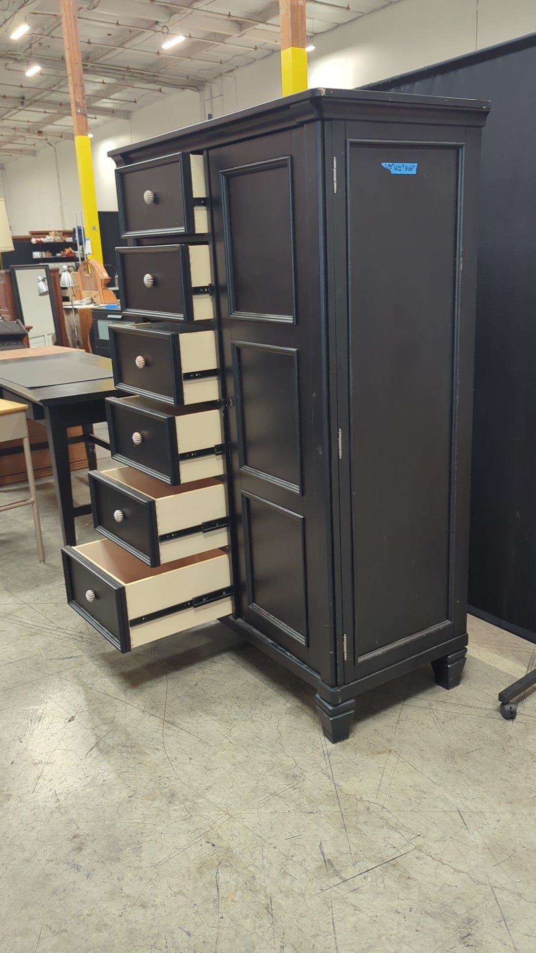 Ashley Furniture Black Wood Armoire with Six Drawers