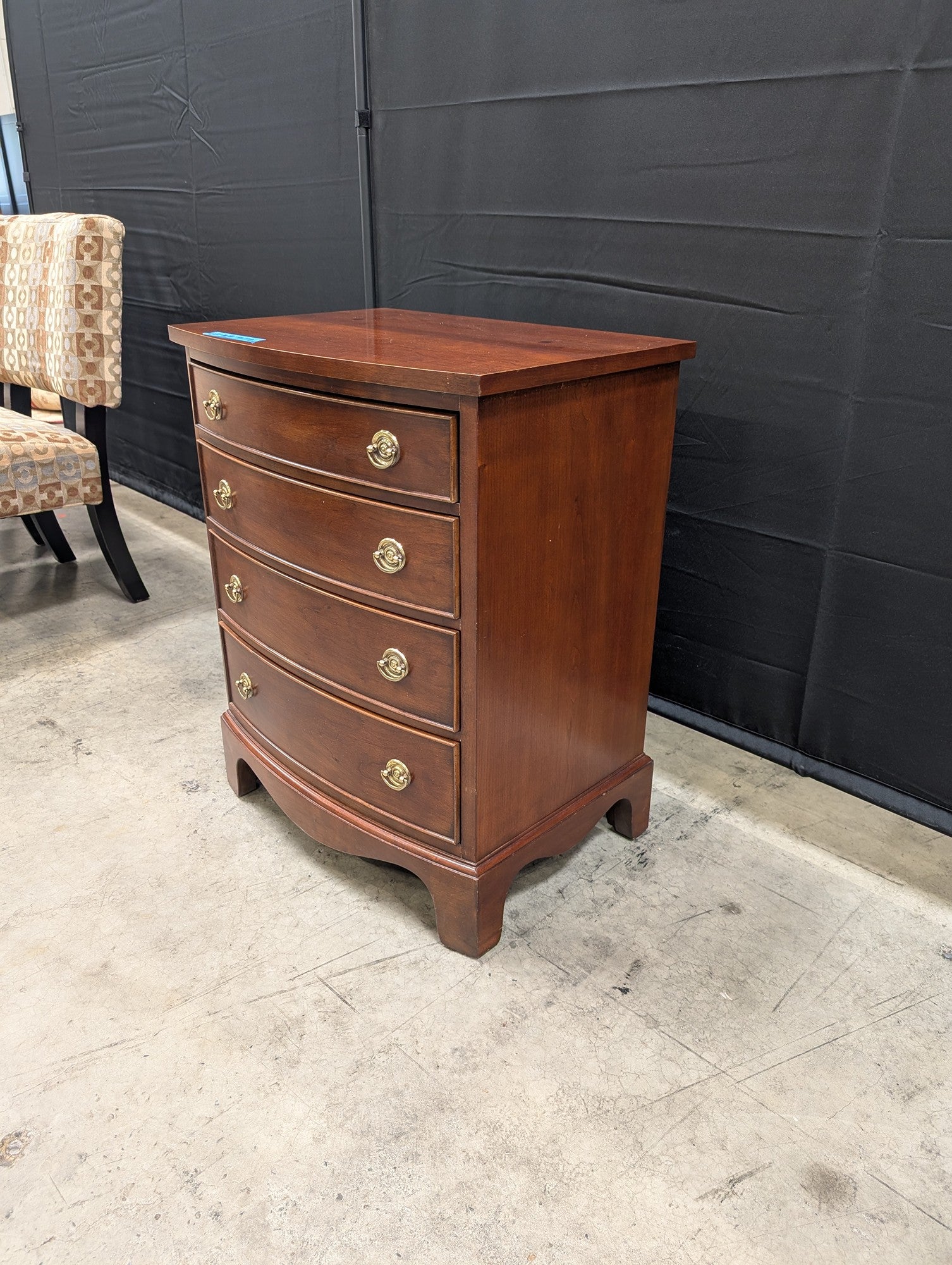 Gordon's Curved Four-Drawer Nightstand in Wood