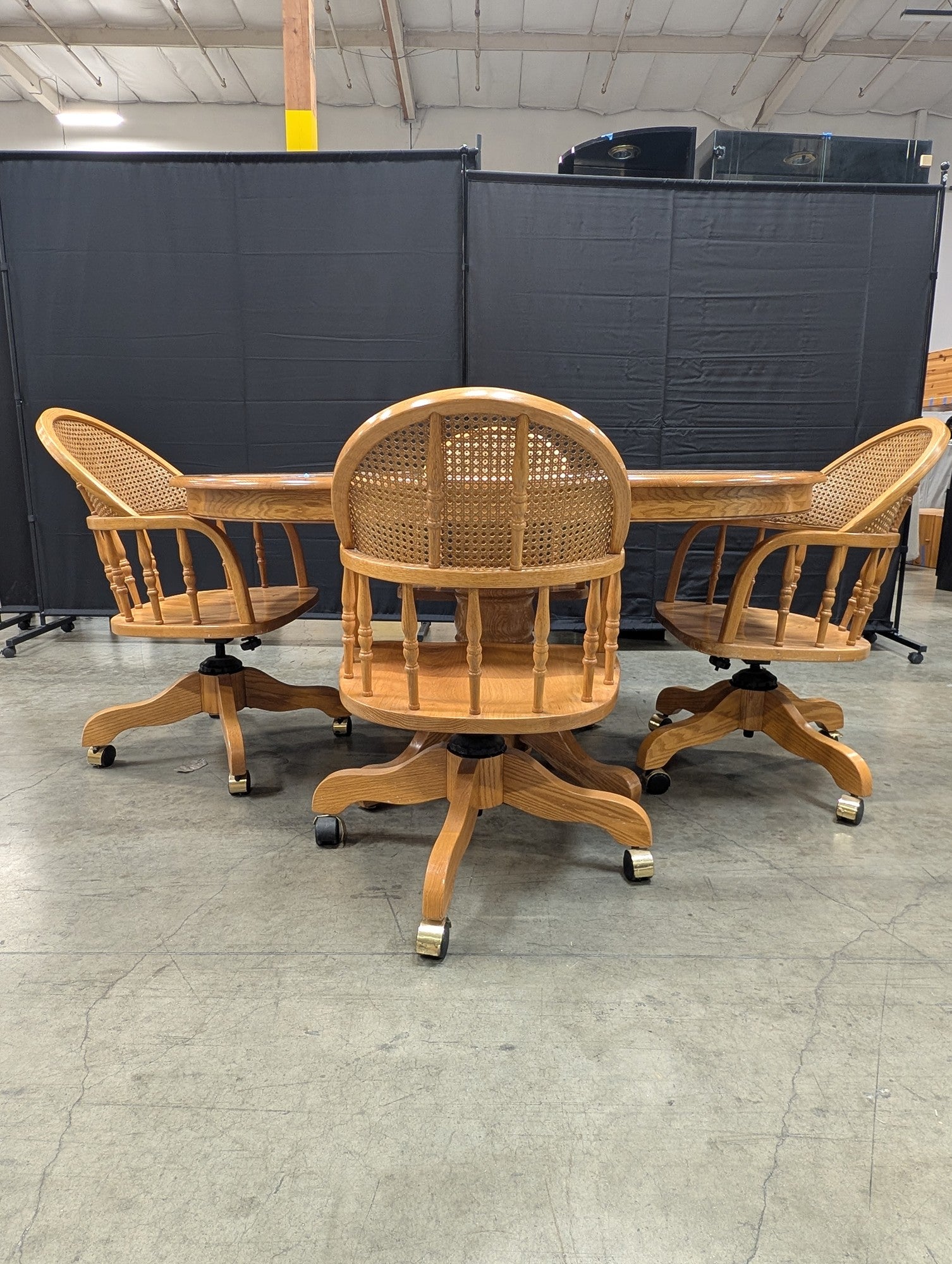 Set with Four Cane Back A-America Furniture Chairs with a Oval Wood Dining Table