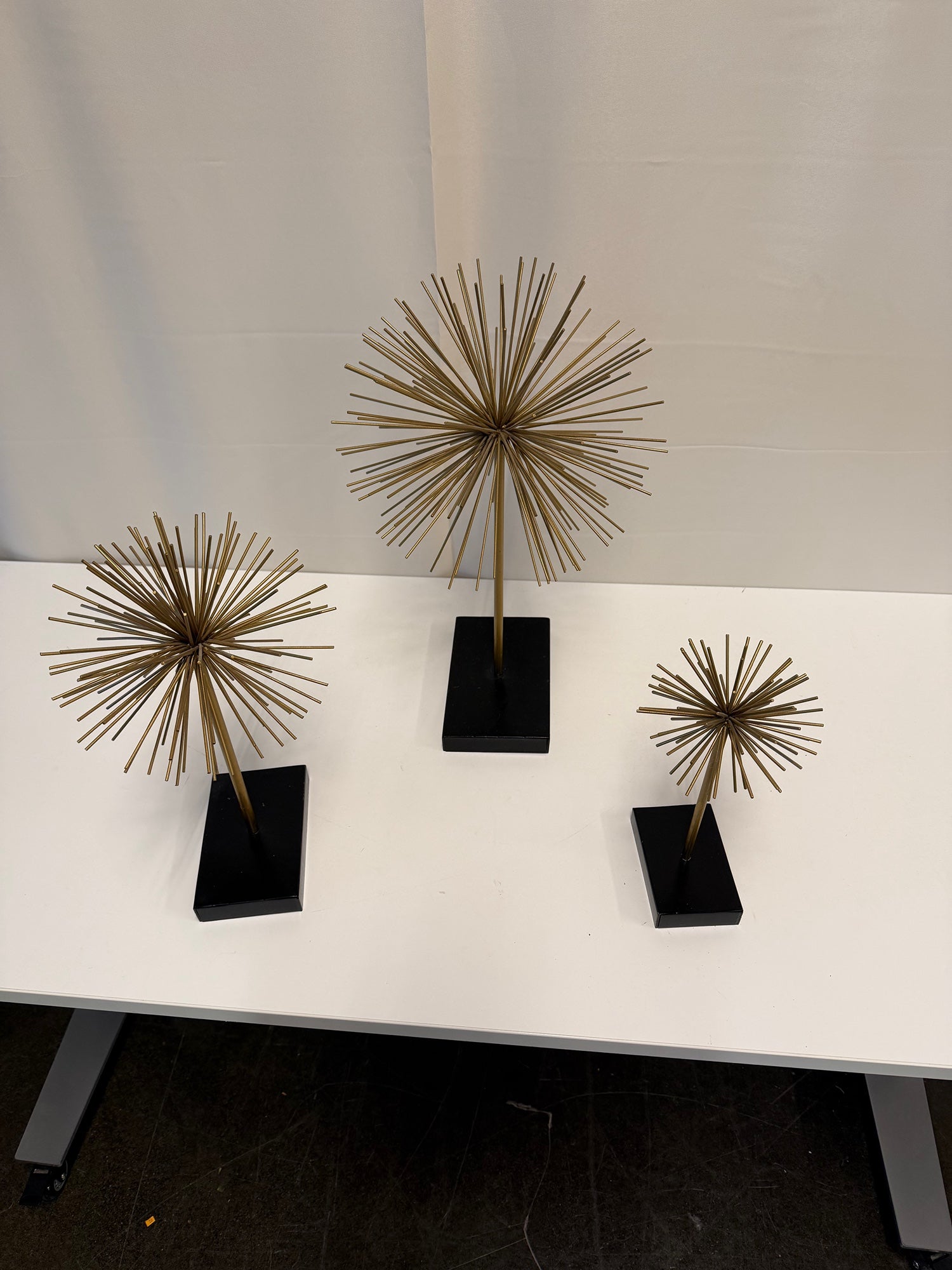 Three Gold Starburst Table Sculptures with Black Base Set