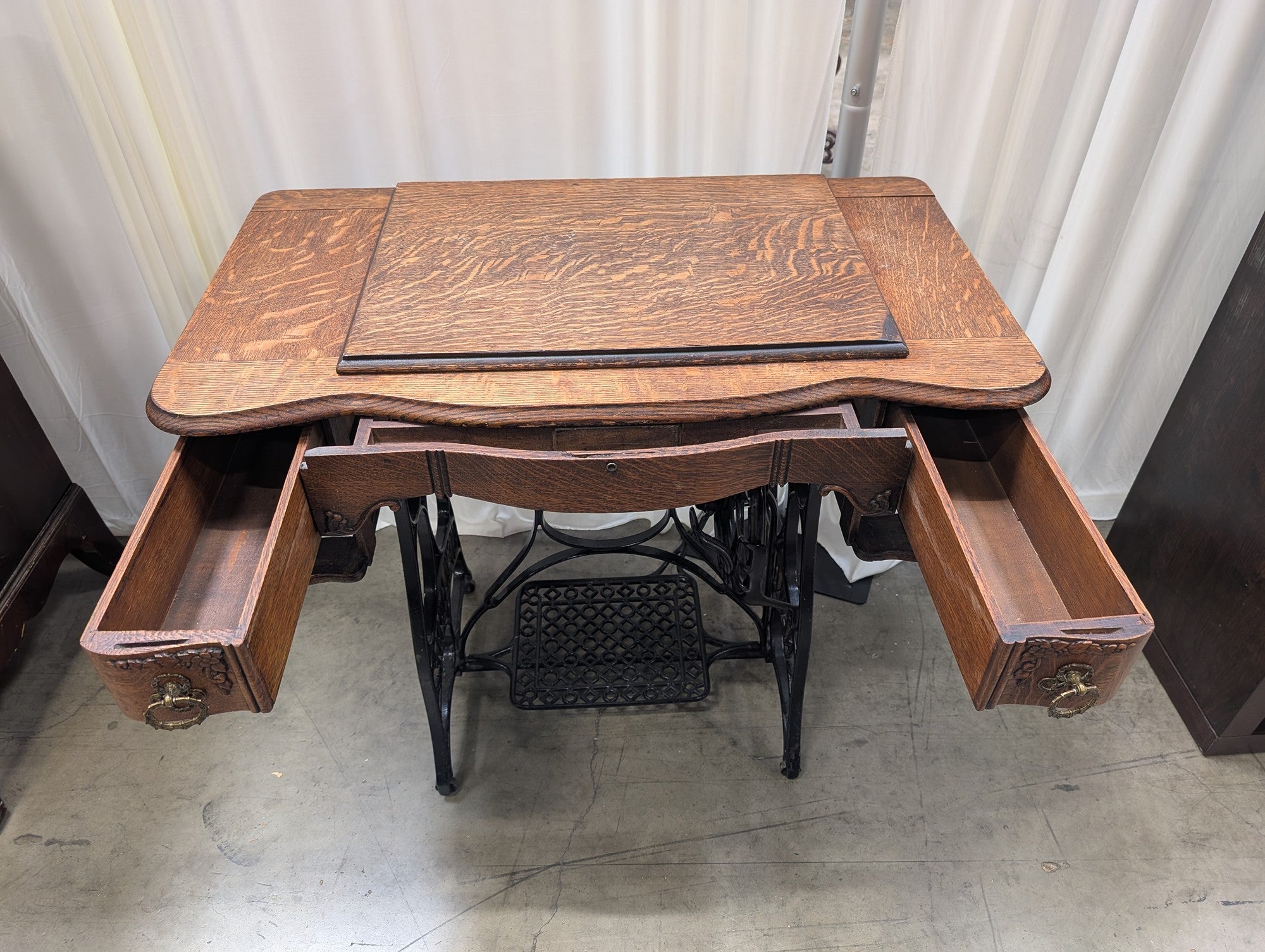 Antique NEW HOME Wood Sewing Machine Cabinet with Ornate Cast Iron Base