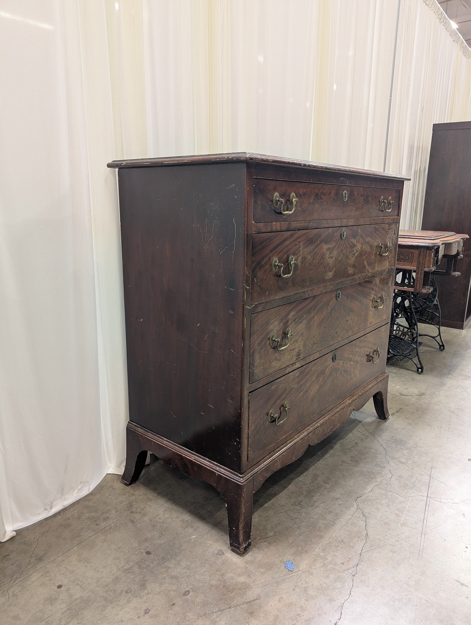 Hathaway's Dark Wood Four-Drawer Dresser with Ornate Hardware
