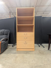 Versatile Light Wood Bookcase with Three Drawers