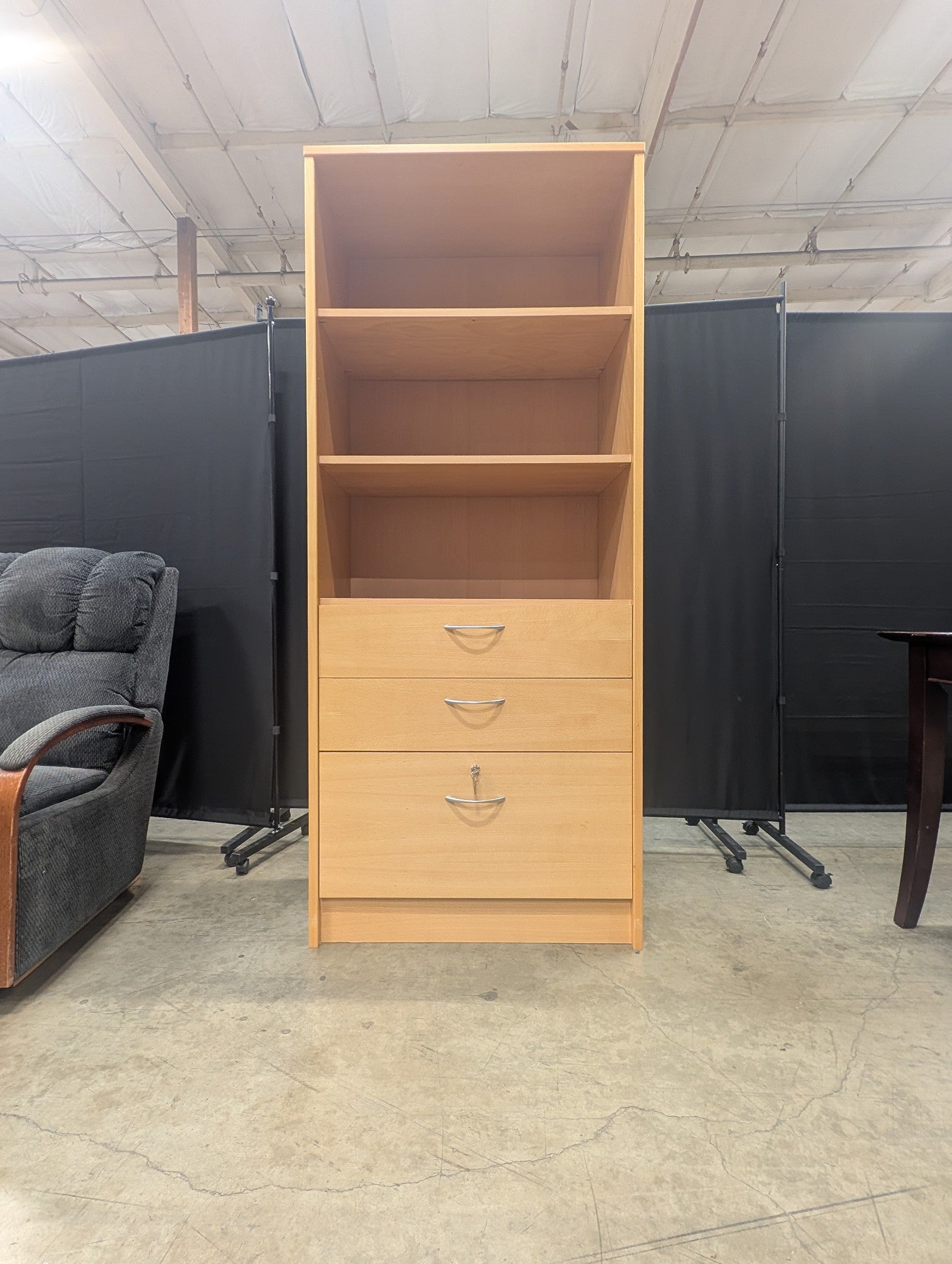 Versatile Light Wood Bookcase with Three Drawers