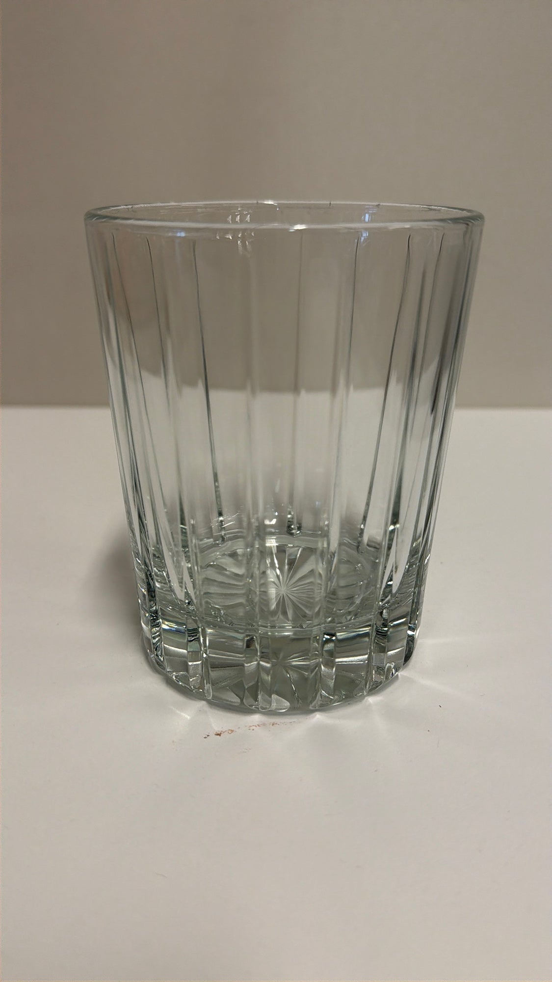 Clear Ribbed Glass Tumbler with Starburst Base