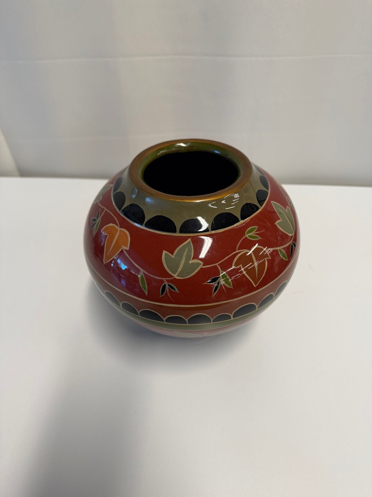 Red Ceramic Globular Vase with Botanical Motif