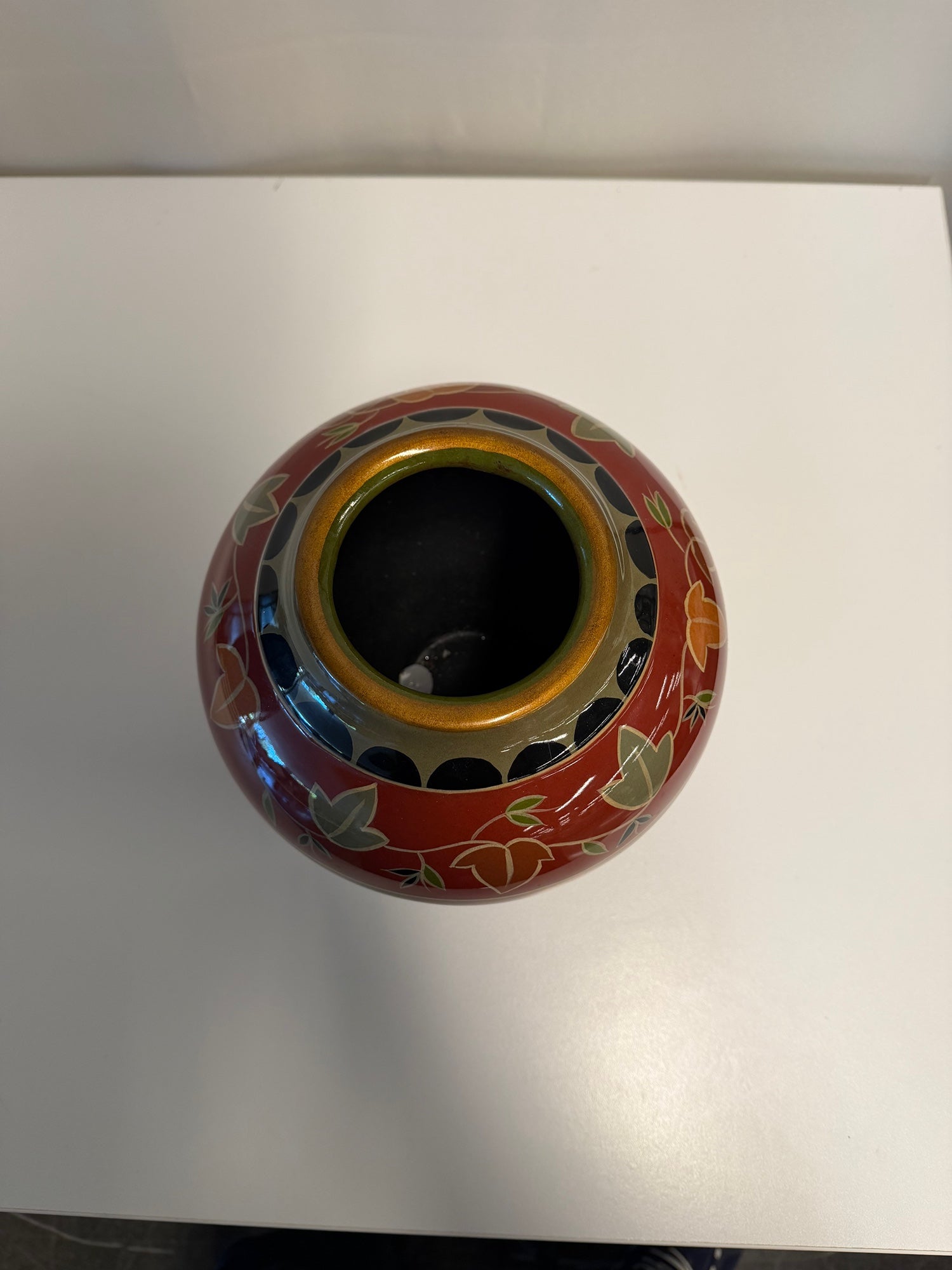 Red Ceramic Globular Vase with Botanical Motif