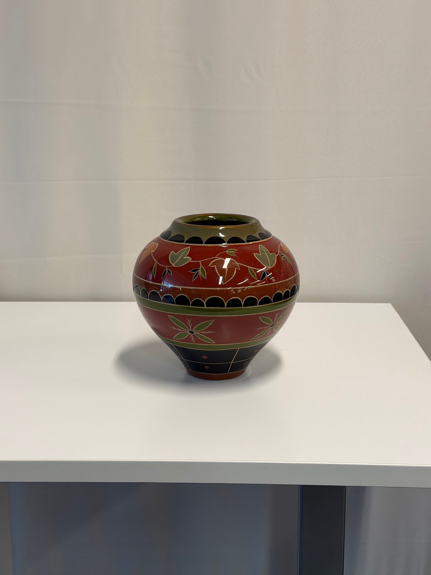 Red Ceramic Globular Vase with Botanical Motif