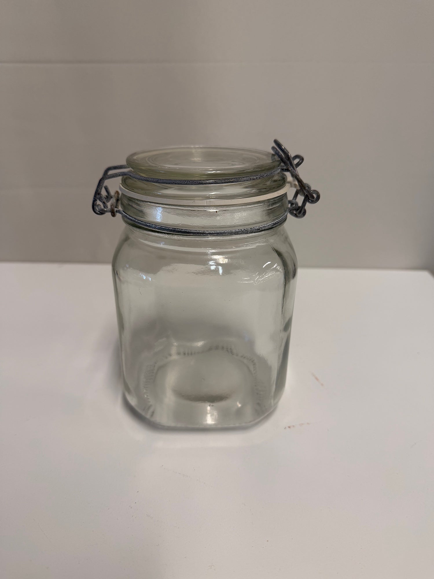 Versatile Clear Glass Clamp-Top Storage Jar