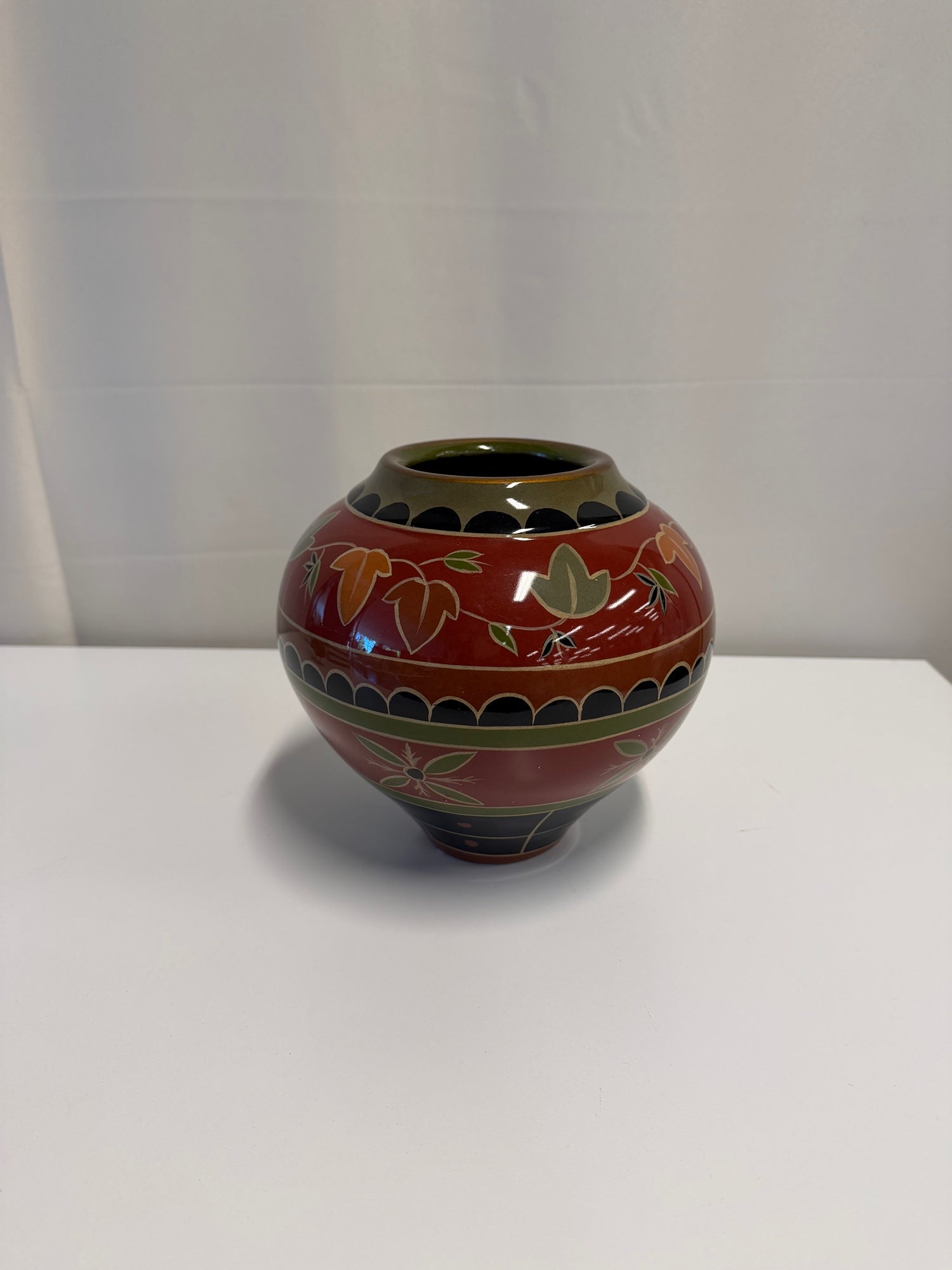 Red Ceramic Globular Vase with Botanical Motif