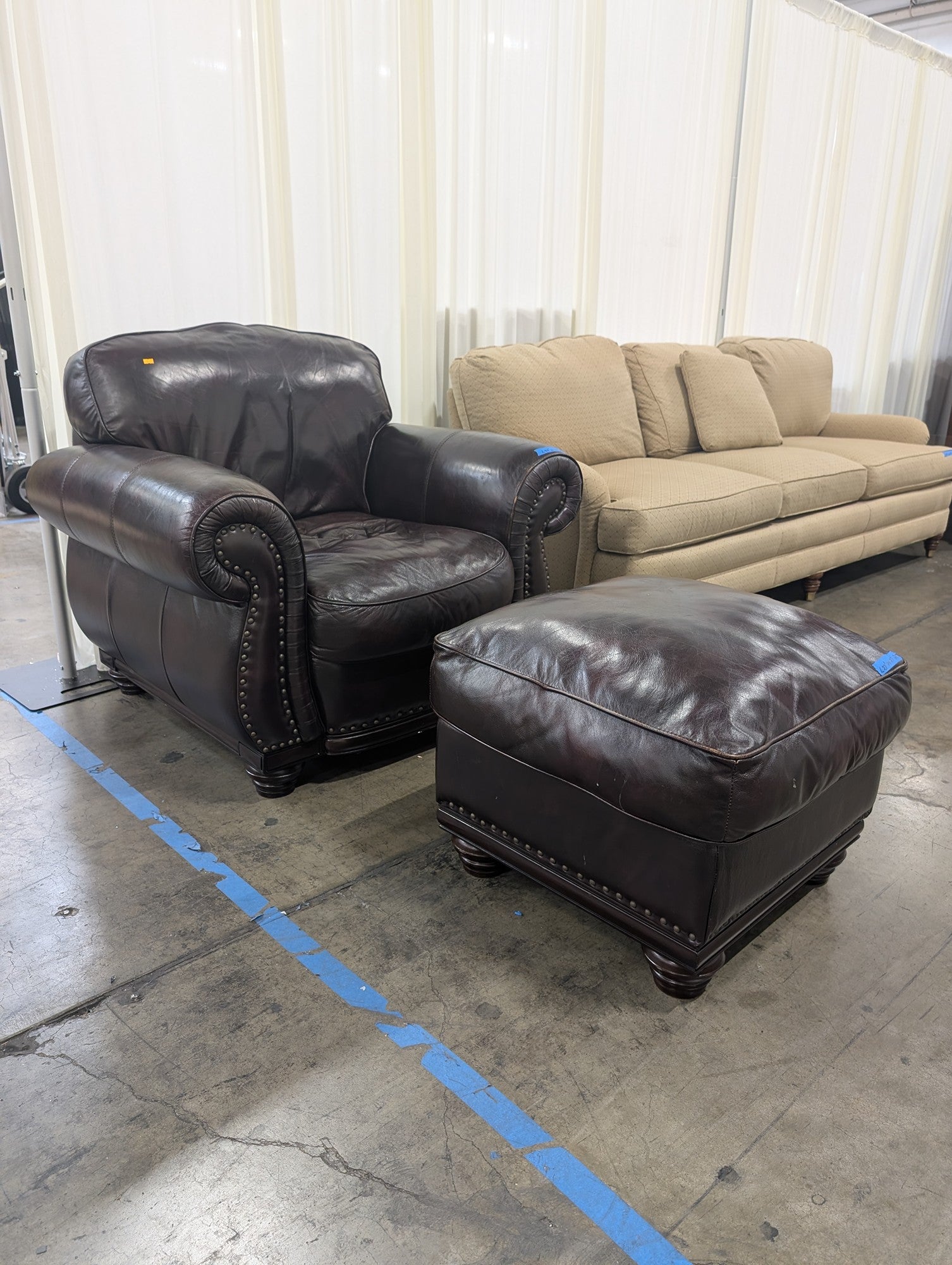 Dark Brown Leather Armchair and Ottoman with Nailhead Trim