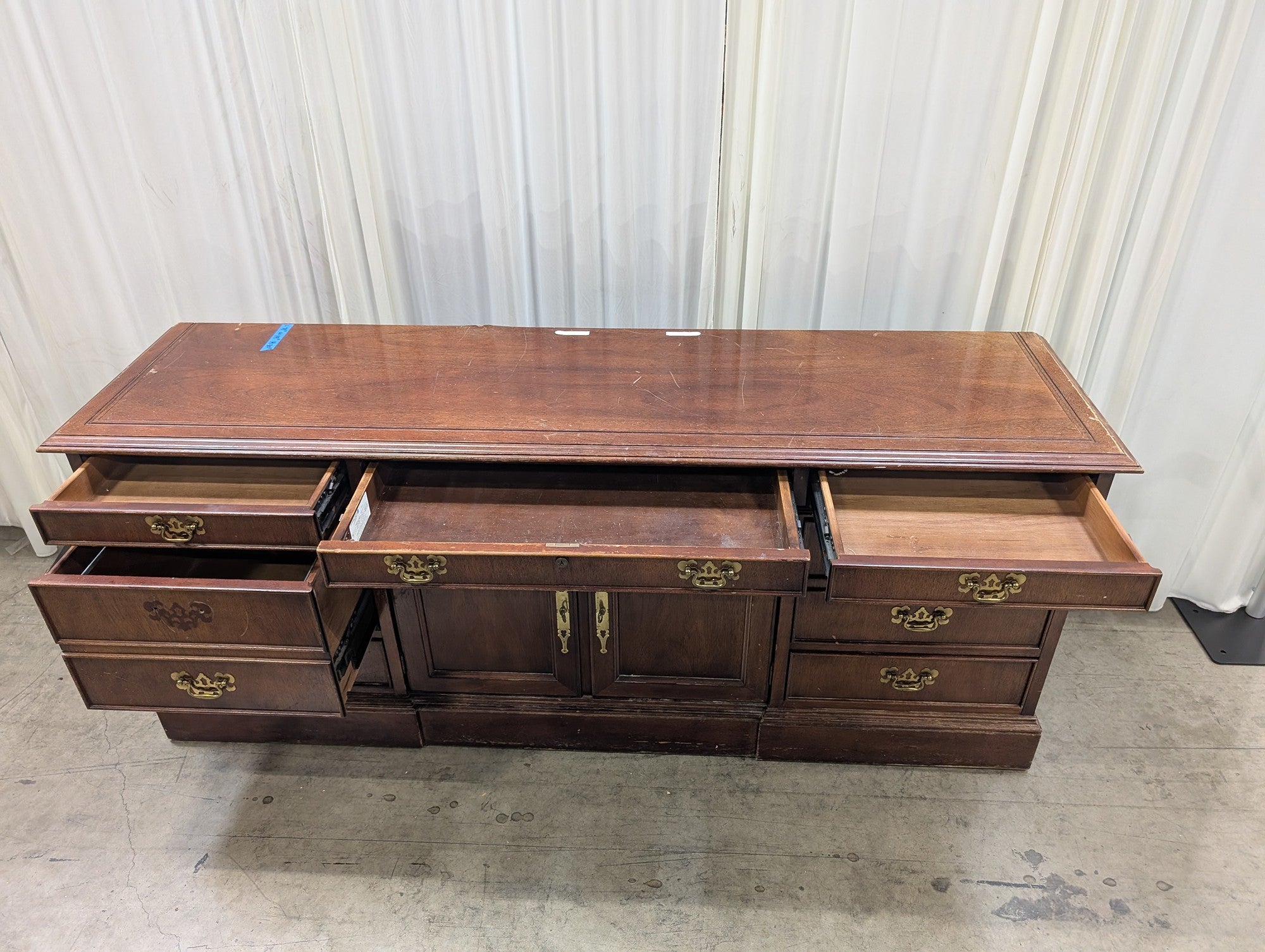 Traditional Dark Wood Buffet with Ornate Hardware