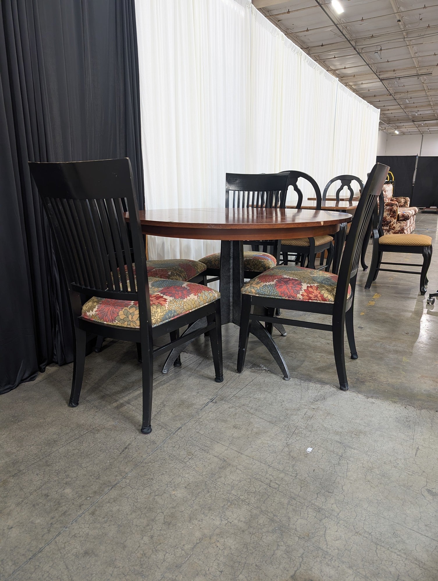 Round Wood Dining Table with Four Ethan Allen Black Chairs