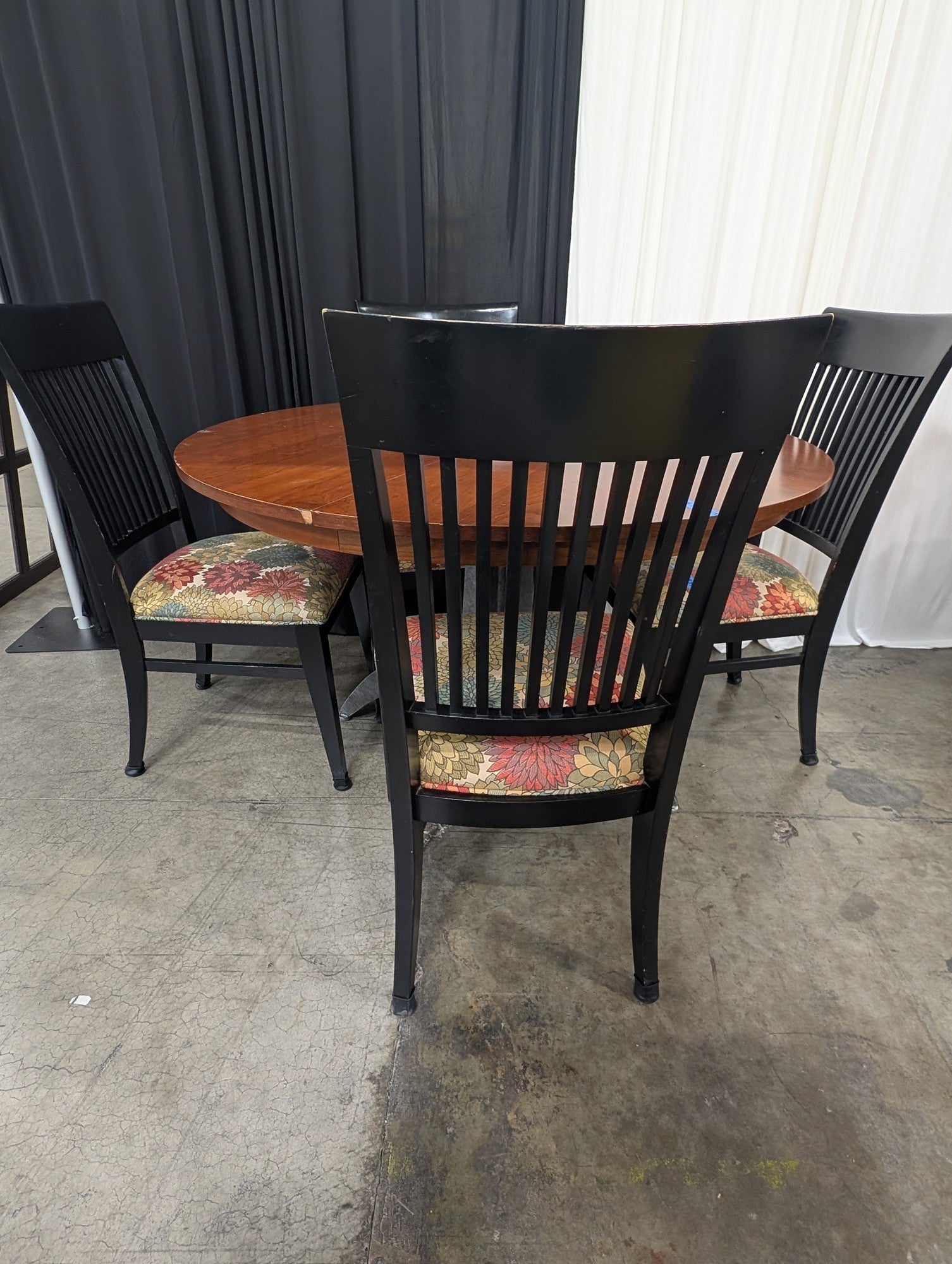 Round Wood Dining Table with Four Ethan Allen Black Chairs